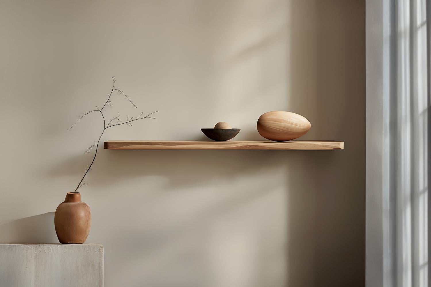 Individual Floating Shelf with One Sculptural Wooden Pebble Accent, Sereno by Joel Escalona

—

What happens when the practical becomes art?
What happens when ornamentation gains significance?

Those were the questions Joel Escalona asked