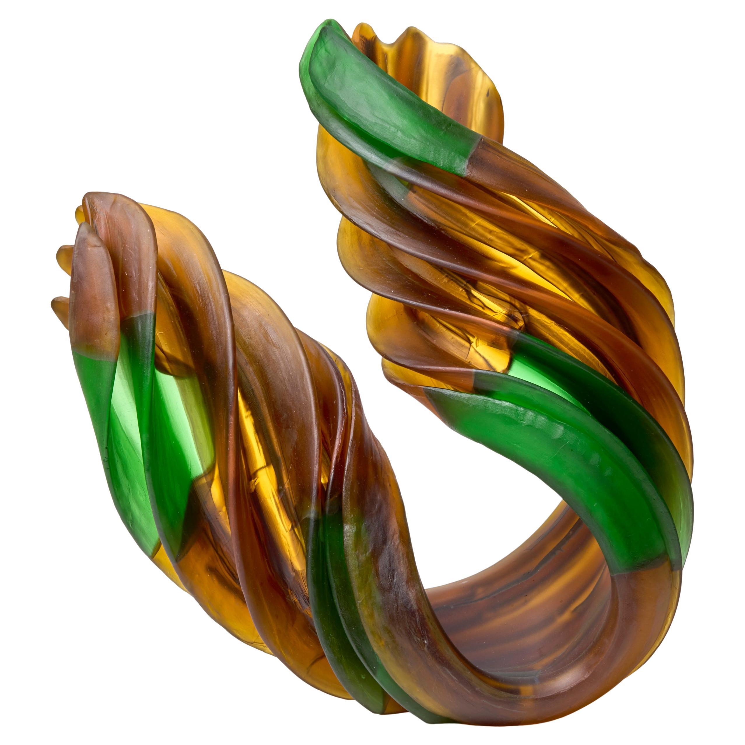 Individual Twist Autumn, a green 
amber glass sculpture by Nina Casson McGarva