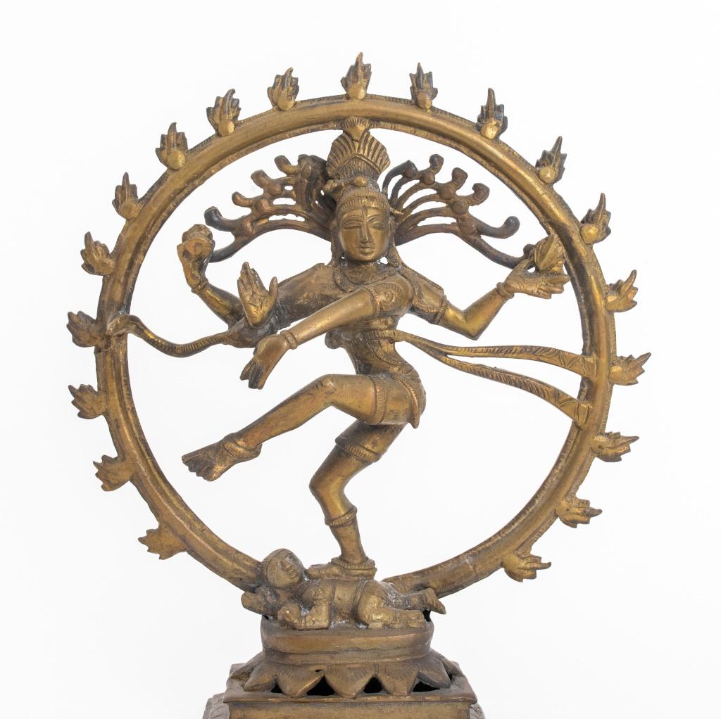 Indo-Nepali brass Shiva Nataraja sculpture depicting the dancing god within an aureole. 9