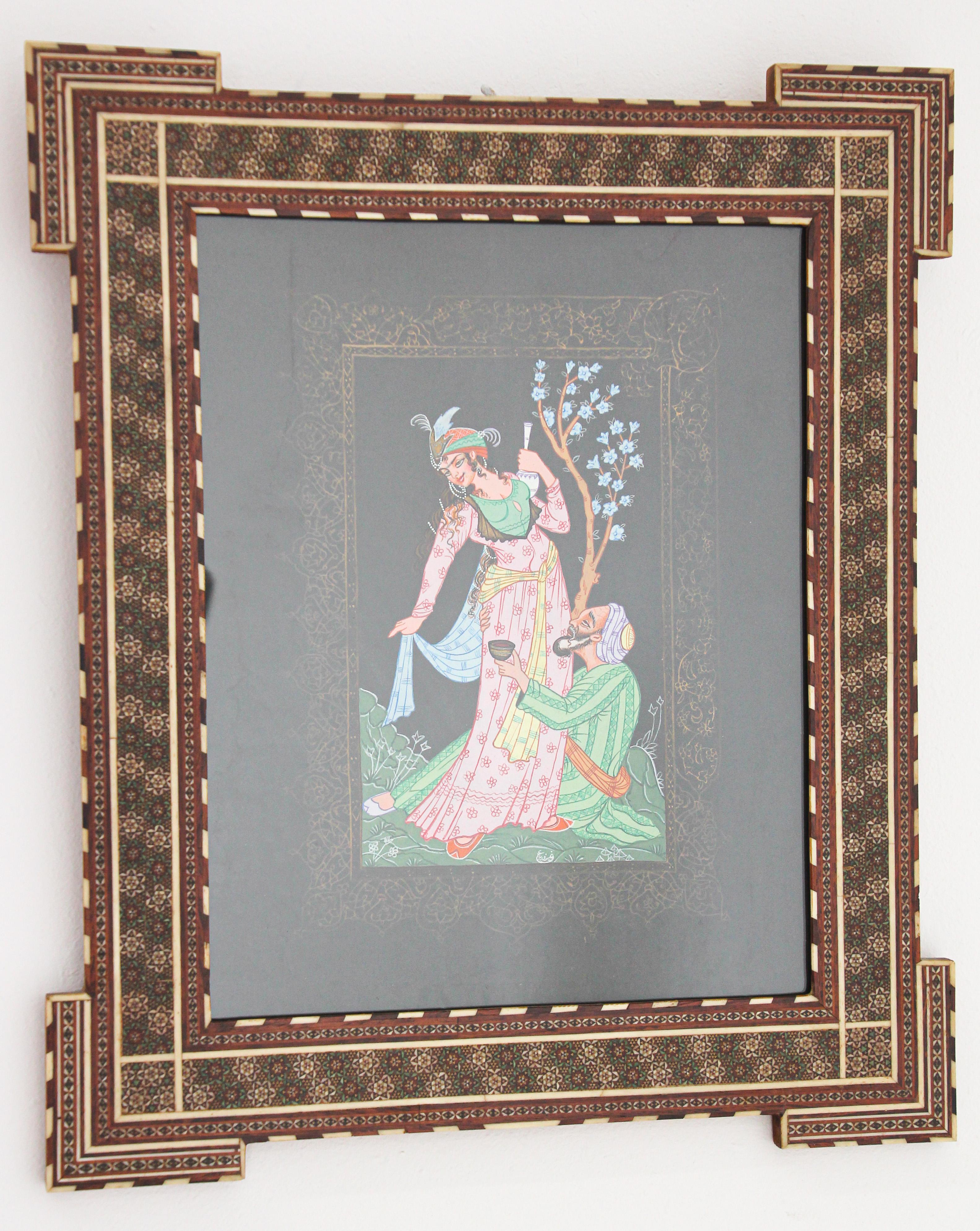 After a 19th century Indo Persian miniature scene painting in a micro mosaic inlaid wood marquetry frame.
Scene of a lady dancing with a man at her feet.
Very fine art work in hand-painted watercolors gouache on paper.
Mughal style miniature