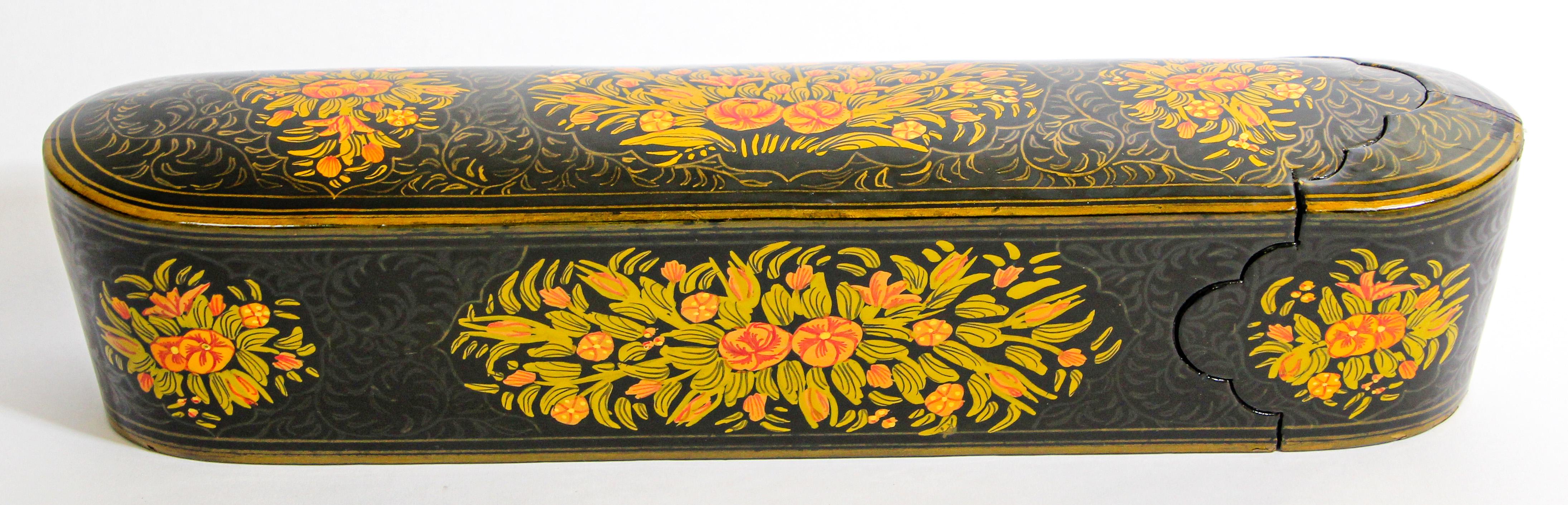 Indo Persian large hand painted lacquer pen box in rectangular shape.
Decorated with floral designs on black background.
Moorish pen box papier maché with painting in the style of Muhammad Hasan, Qajar Persia.
Size is 14.5