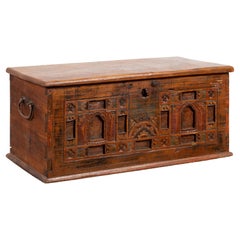 Indonesian 19th Century Blanket Chest with Carved Motifs and Lateral Handles