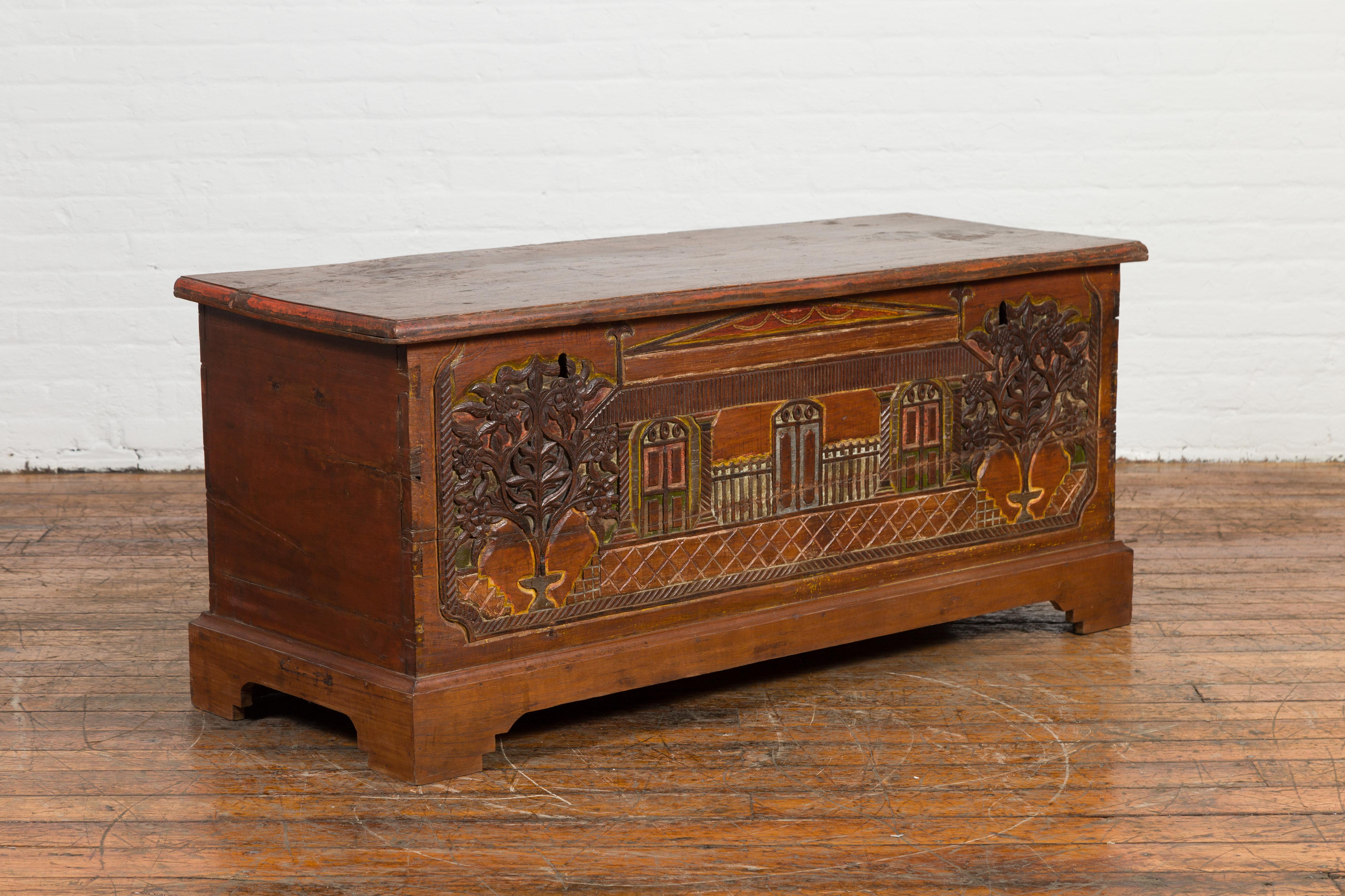 Indonesian 19th Century Carved and Painted Trunk with Architecture and Foliage In Good Condition For Sale In Yonkers, NY
