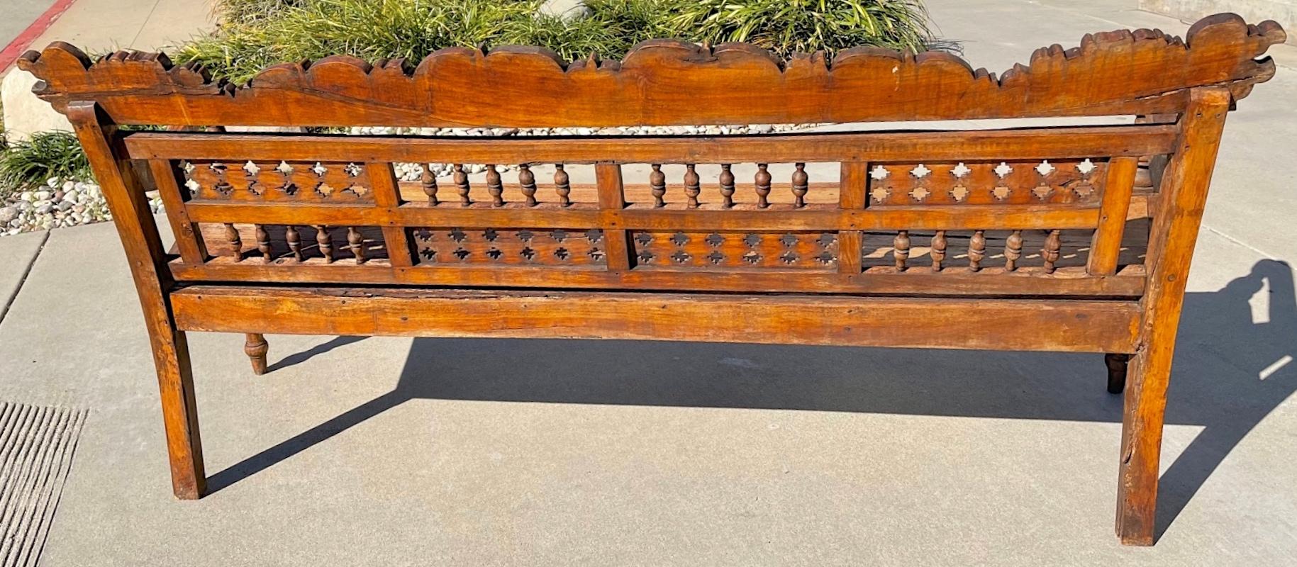 Indonesian 19th Century Hand Carved Teak Garden Bench with Two Side Arms 4