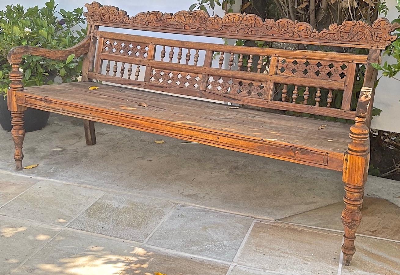 Indonesian 19th Century Hand Carved Teak Garden Bench with Two Side Arms 1