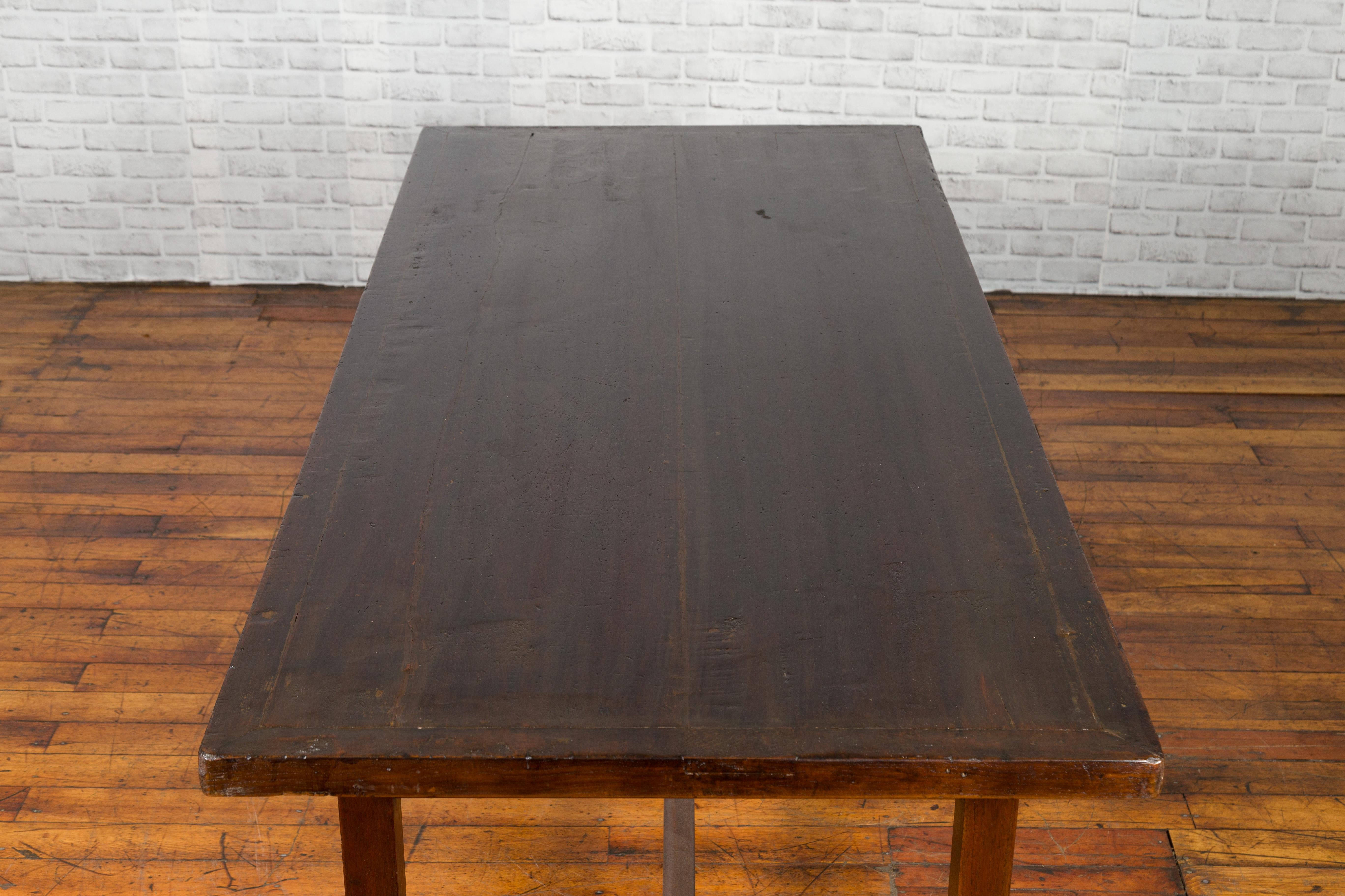 Indonesian 20th Century Table with Dark Brown Patina and H-Form Stretcher 6