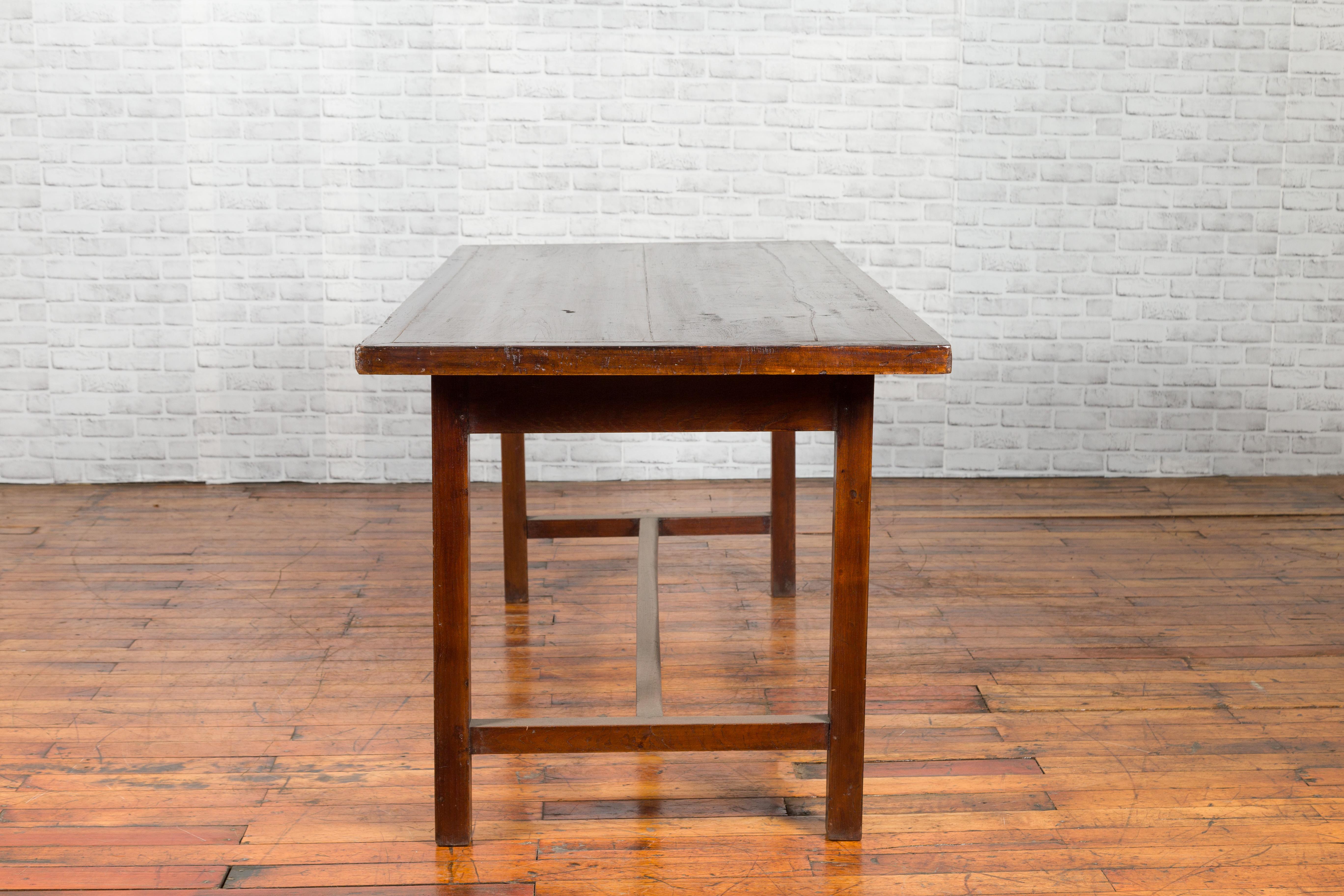 Indonesian 20th Century Table with Dark Brown Patina and H-Form Stretcher 9