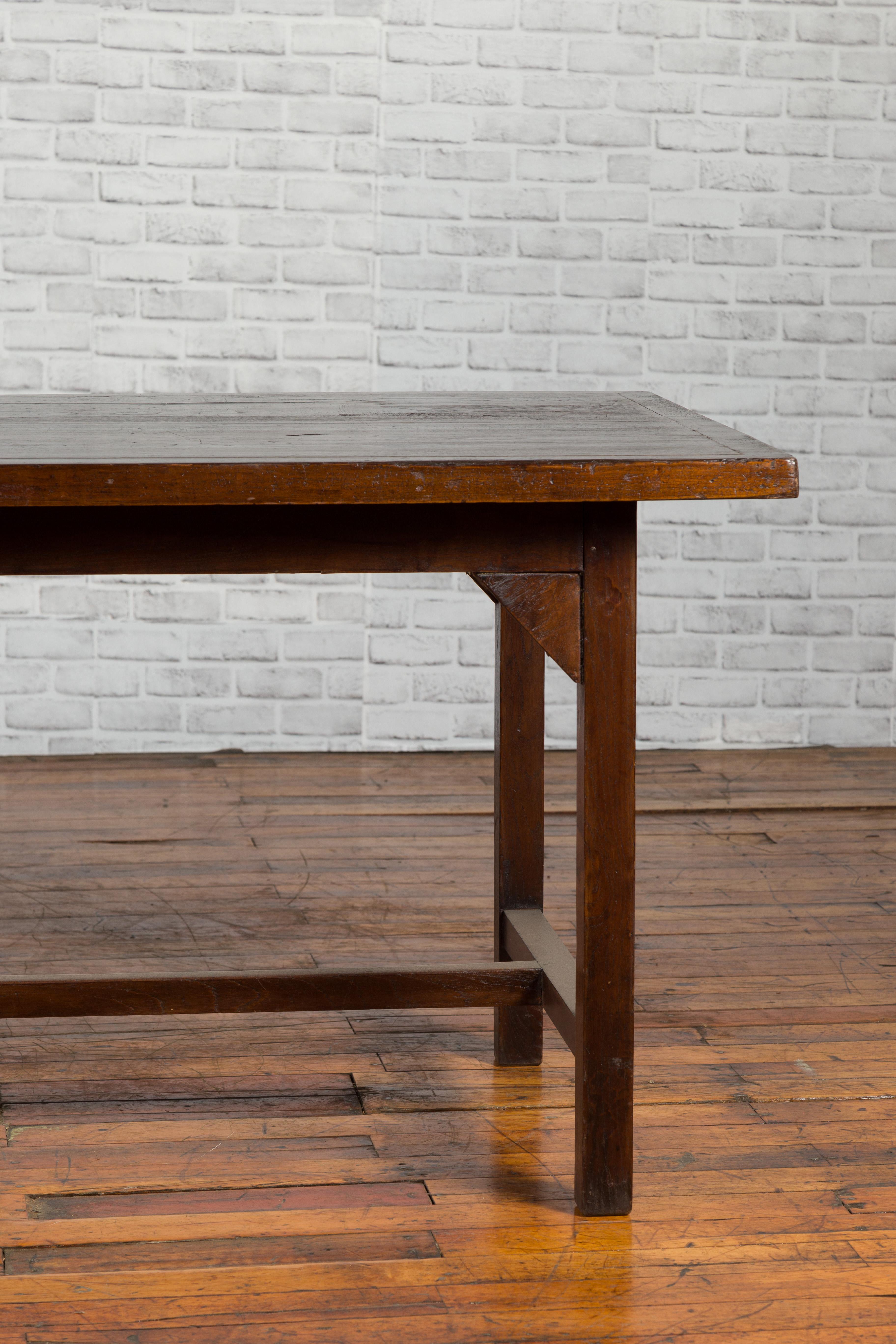 Indonesian 20th Century Table with Dark Brown Patina and H-Form Stretcher 2