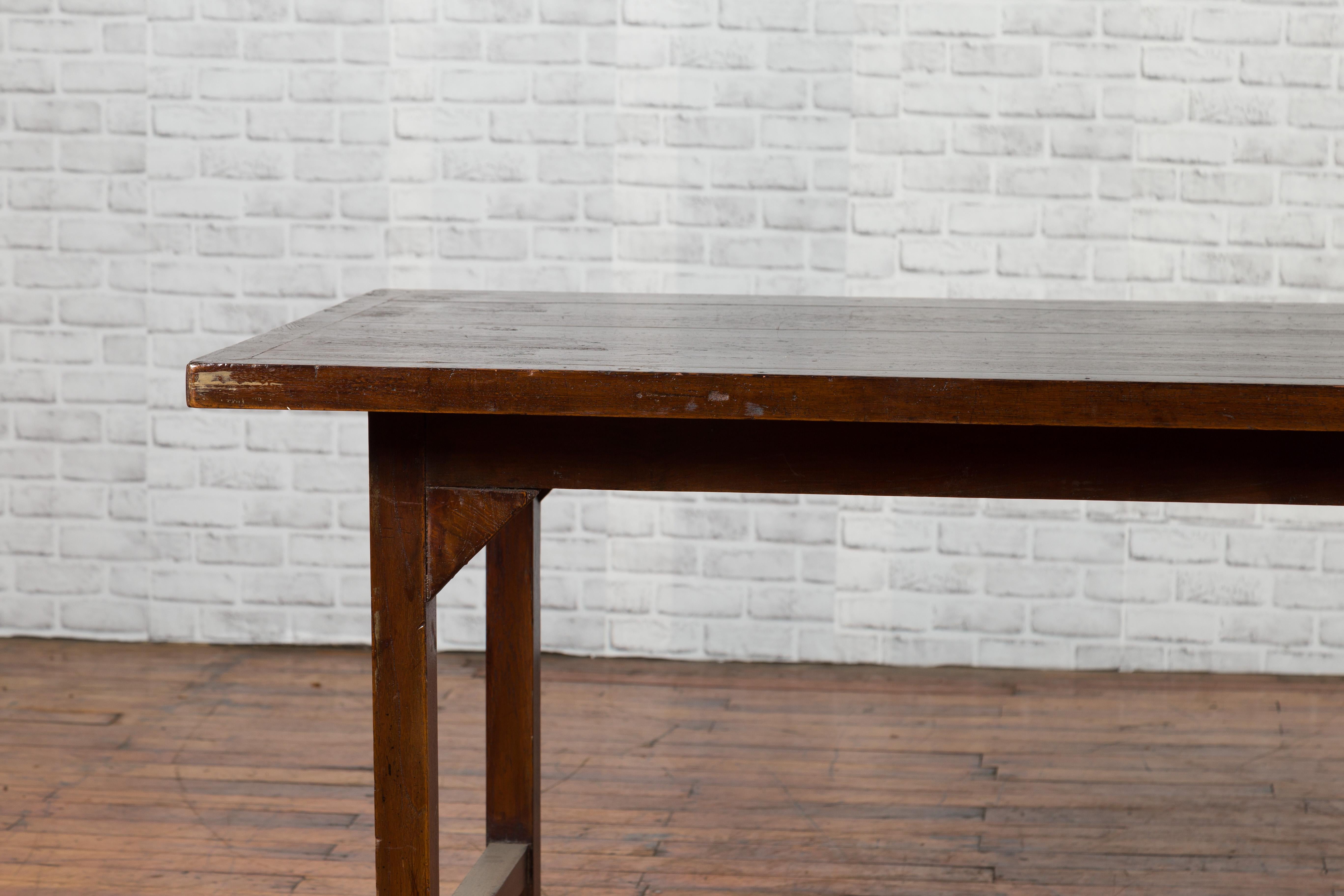 Indonesian 20th Century Table with Dark Brown Patina and H-Form Stretcher 3