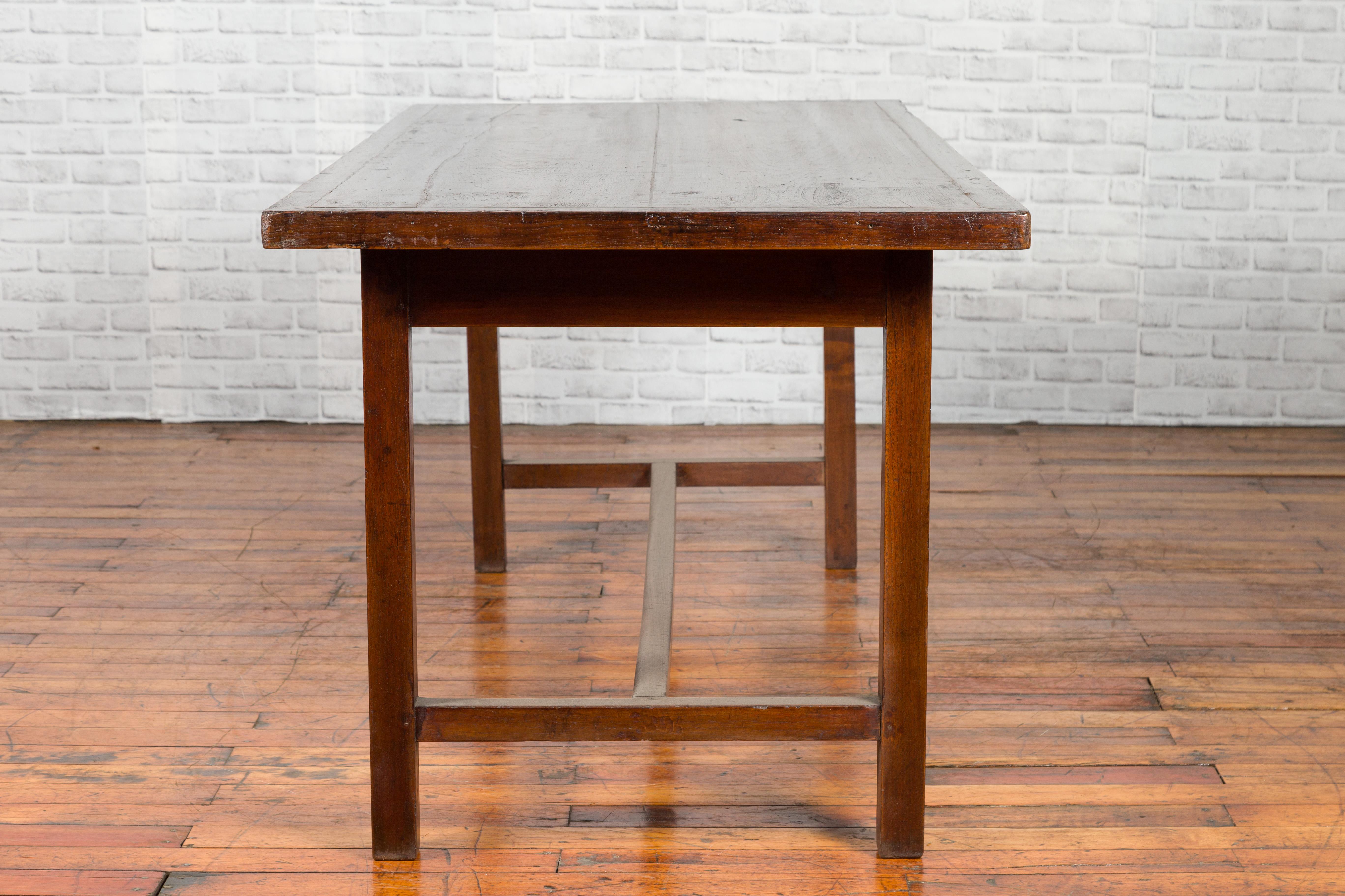 Indonesian 20th Century Table with Dark Brown Patina and H-Form Stretcher 5