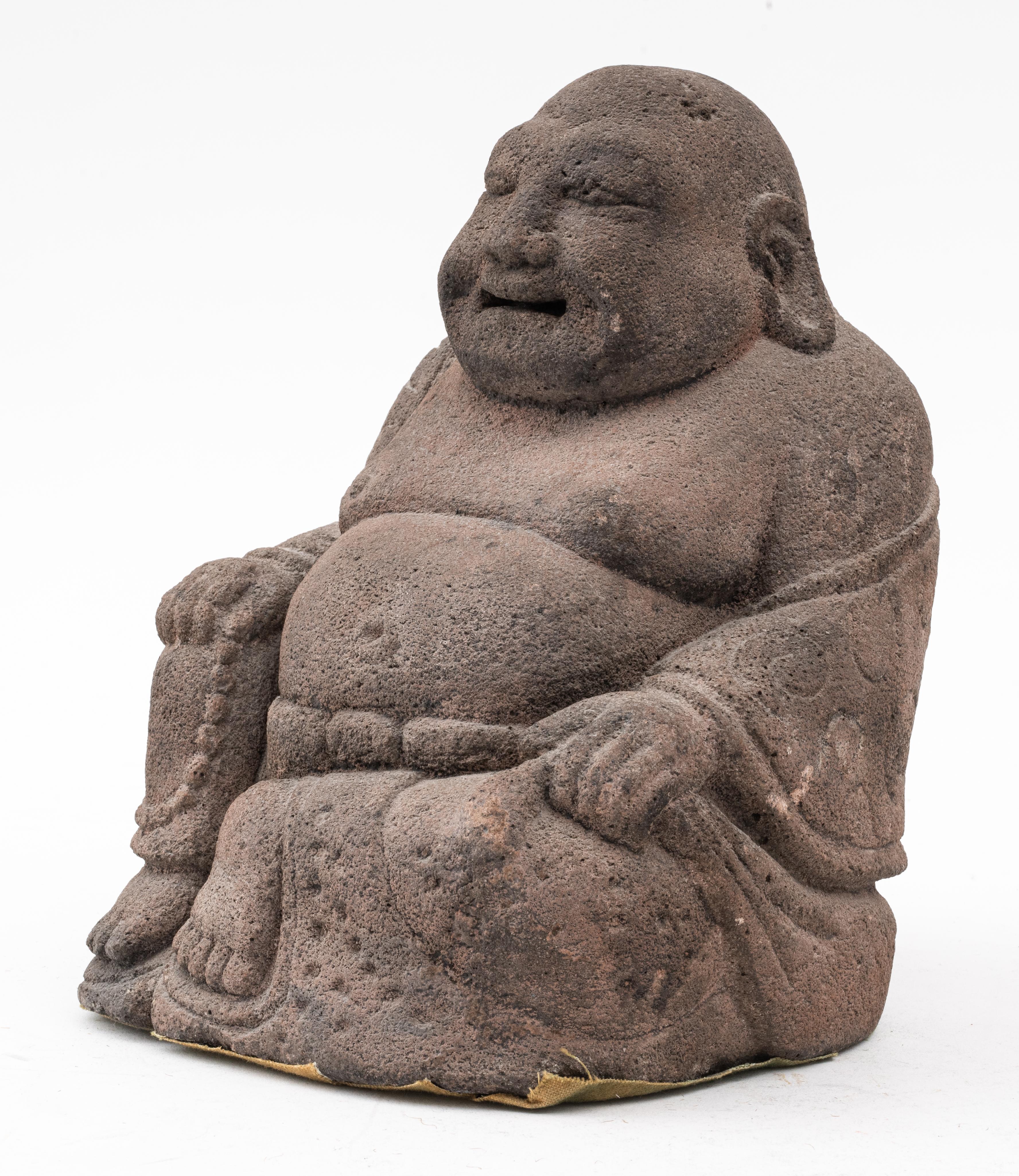 Javanese andesite carved sculpture of the happy Buddha / Kubera / Kuvera / Kuber seated, 16th century or later. 
Measures: 9.2