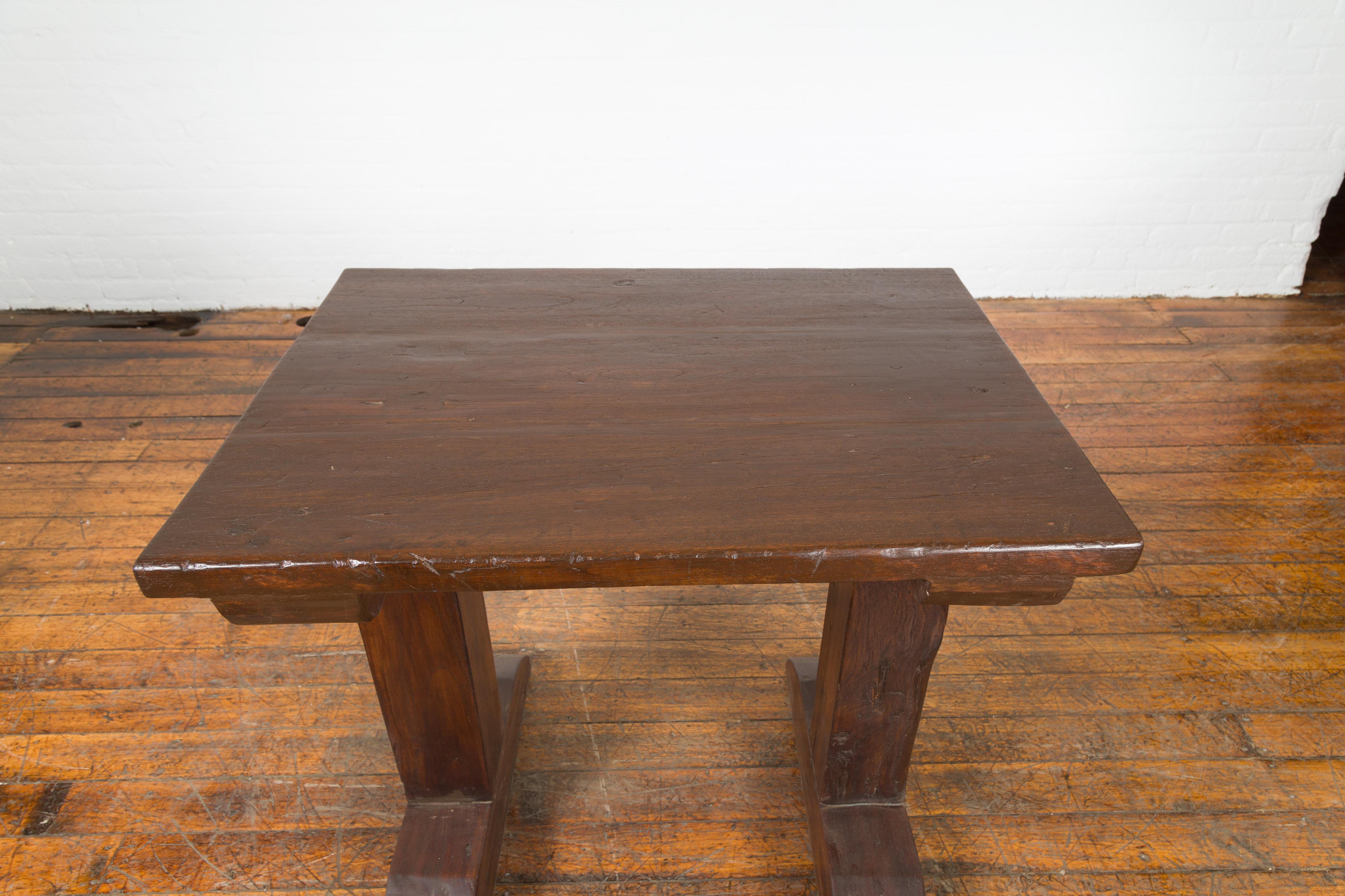 Wood Indonesian Antique Wine Tasting Table with Rustic Appearance and Trestle Base For Sale