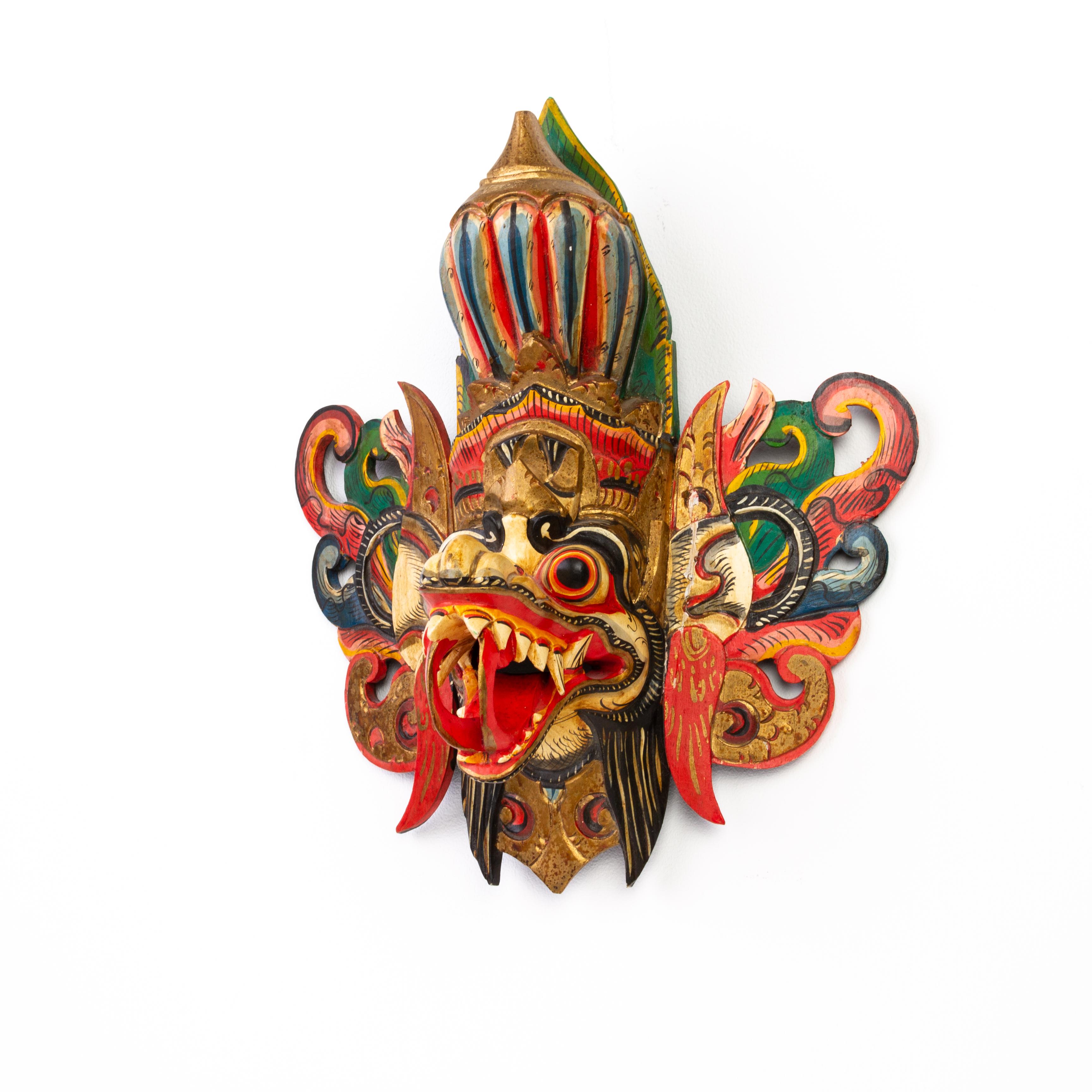 2nd half of the 20th century, a Balinese mask made of polychromed light wood, ready to hang. Vibrant colours and well carved.