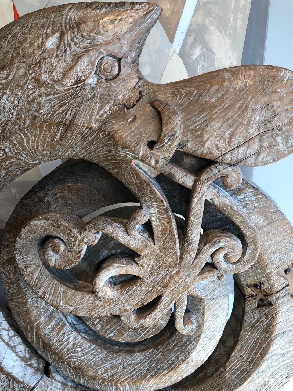 This impressive sculpture is incredibly smooth to the touch due to the teak root, which had a long life underground, where the constant movement of water gave it this fluid feel. The spiral detail of this sculpture is typically from Borneo and the
