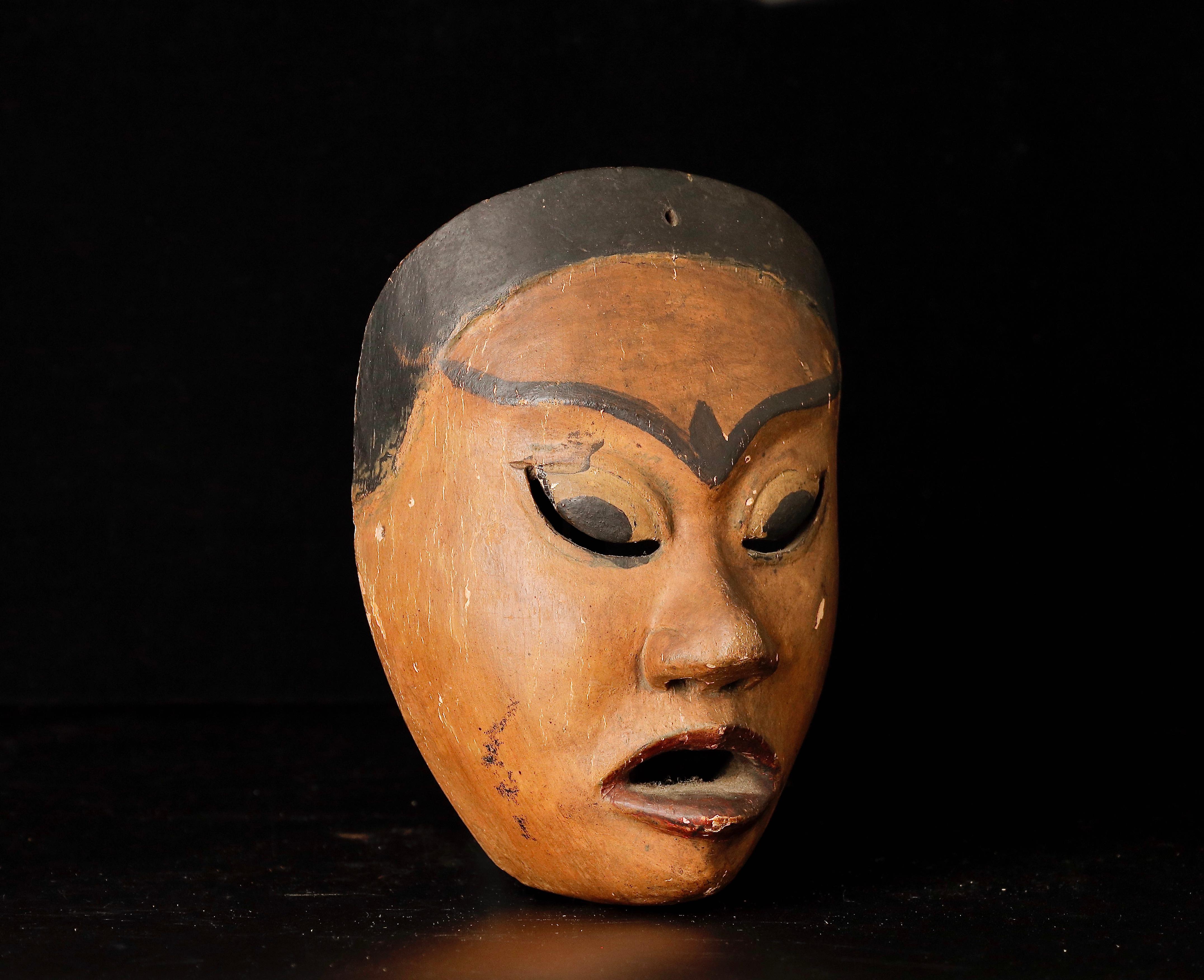 Carved Indonesian Ceremonial Performance Mask, 19th Century