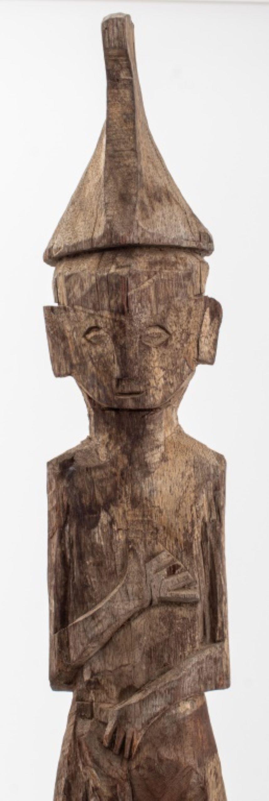 Anglo-Indian Indonesian Dayak Wood Male Hampatong Sculpture For Sale
