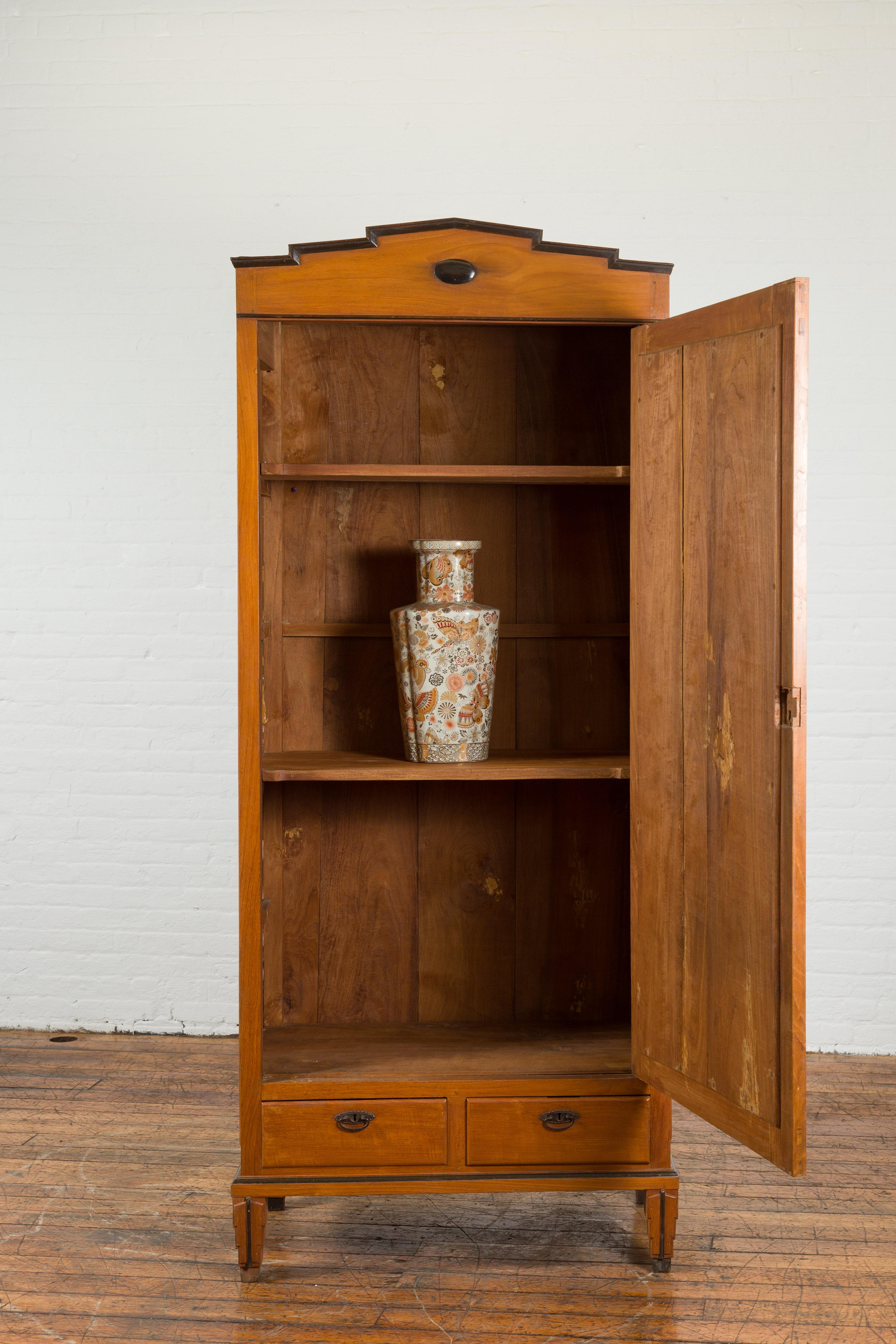 Indonesian Early 20th Century Cabinet with Mirrored Door and Carved Cornice In Good Condition In Yonkers, NY