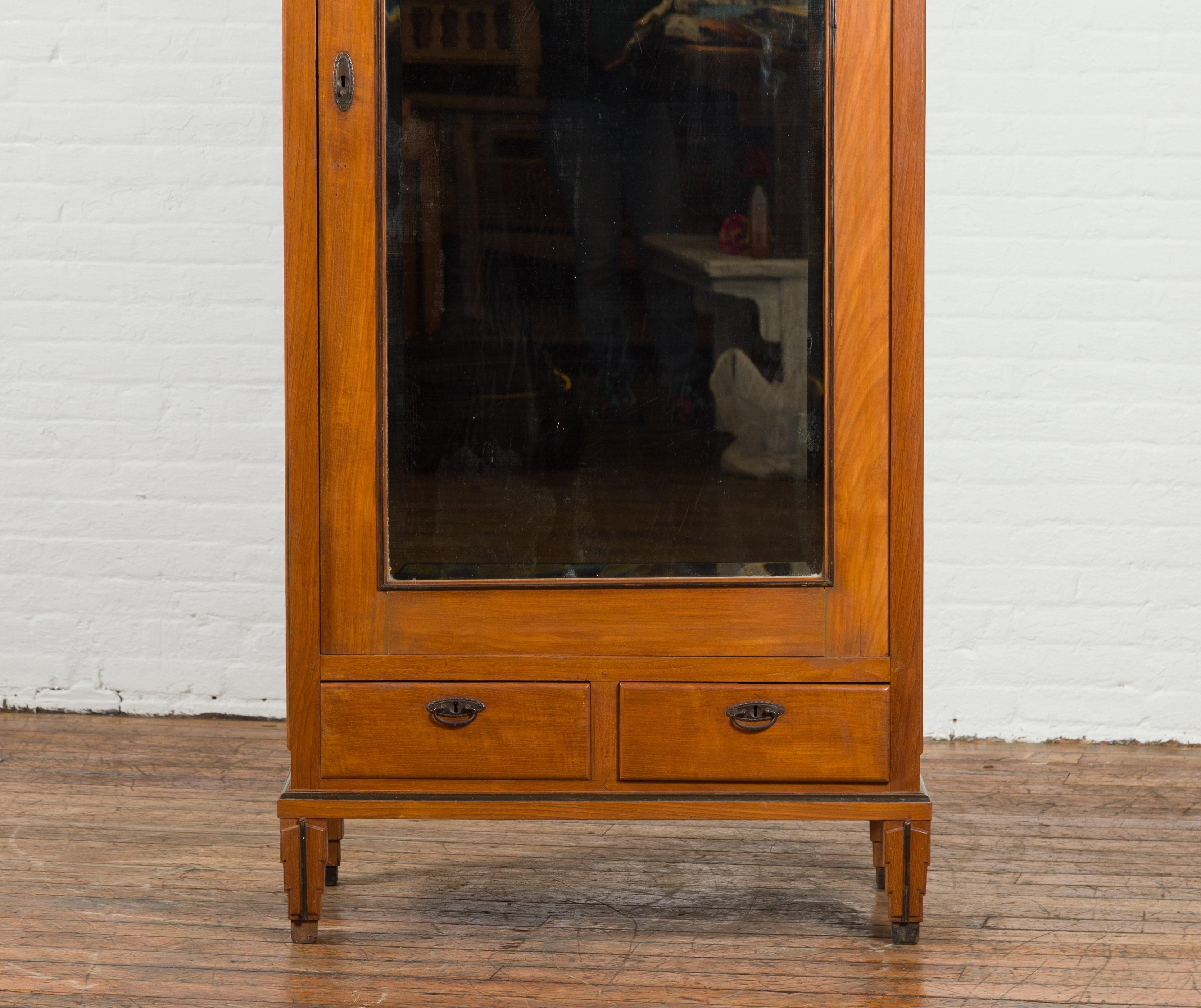 Indonesian Early 20th Century Cabinet with Mirrored Door and Carved Cornice 3