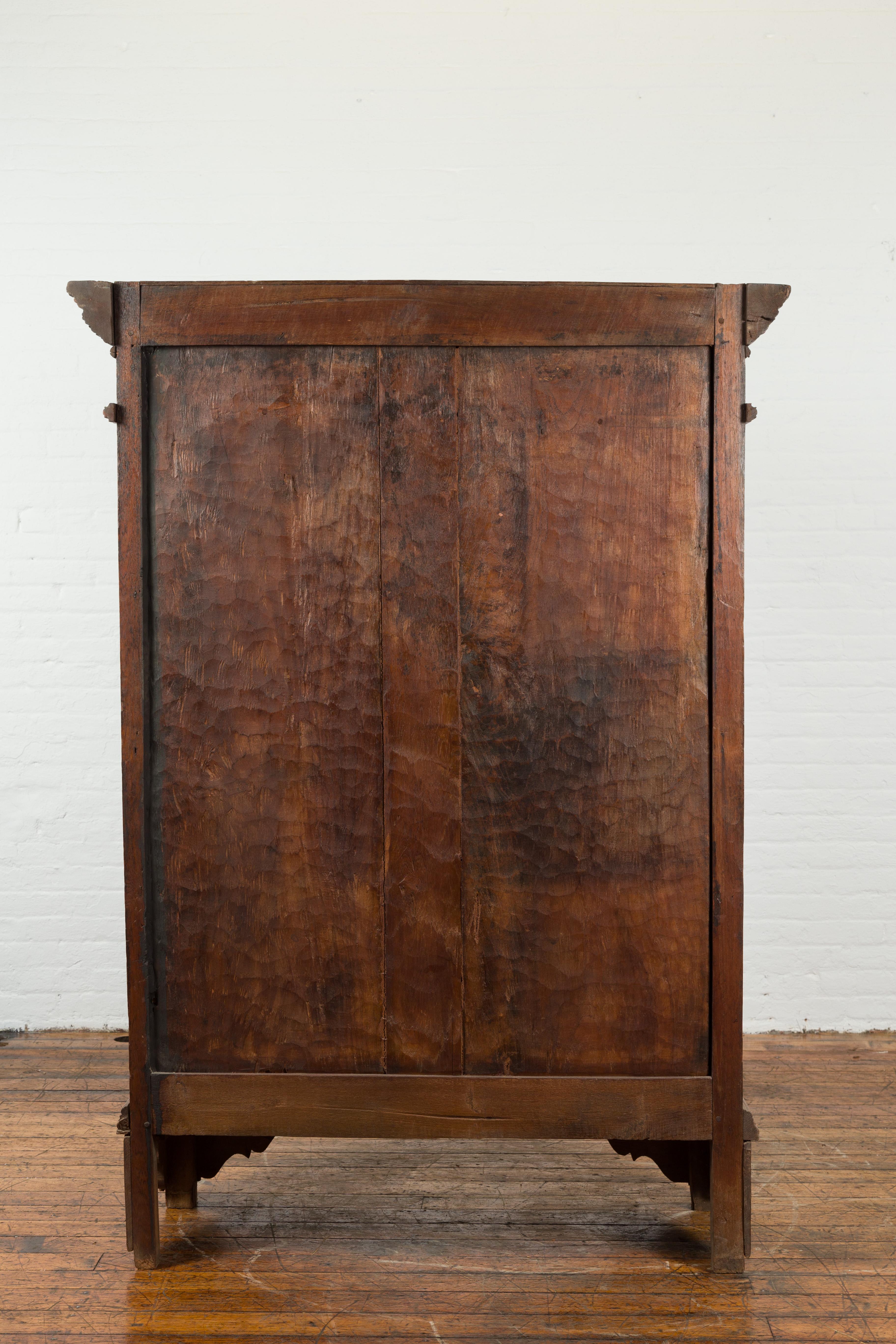 Indonesian Early 20th Century Carved Teak Wood Cabinet with Molded Cartouches For Sale 12