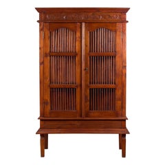 Indonesian Early 20th Century Openwork Cabinet with Carved Scrolling Foliage