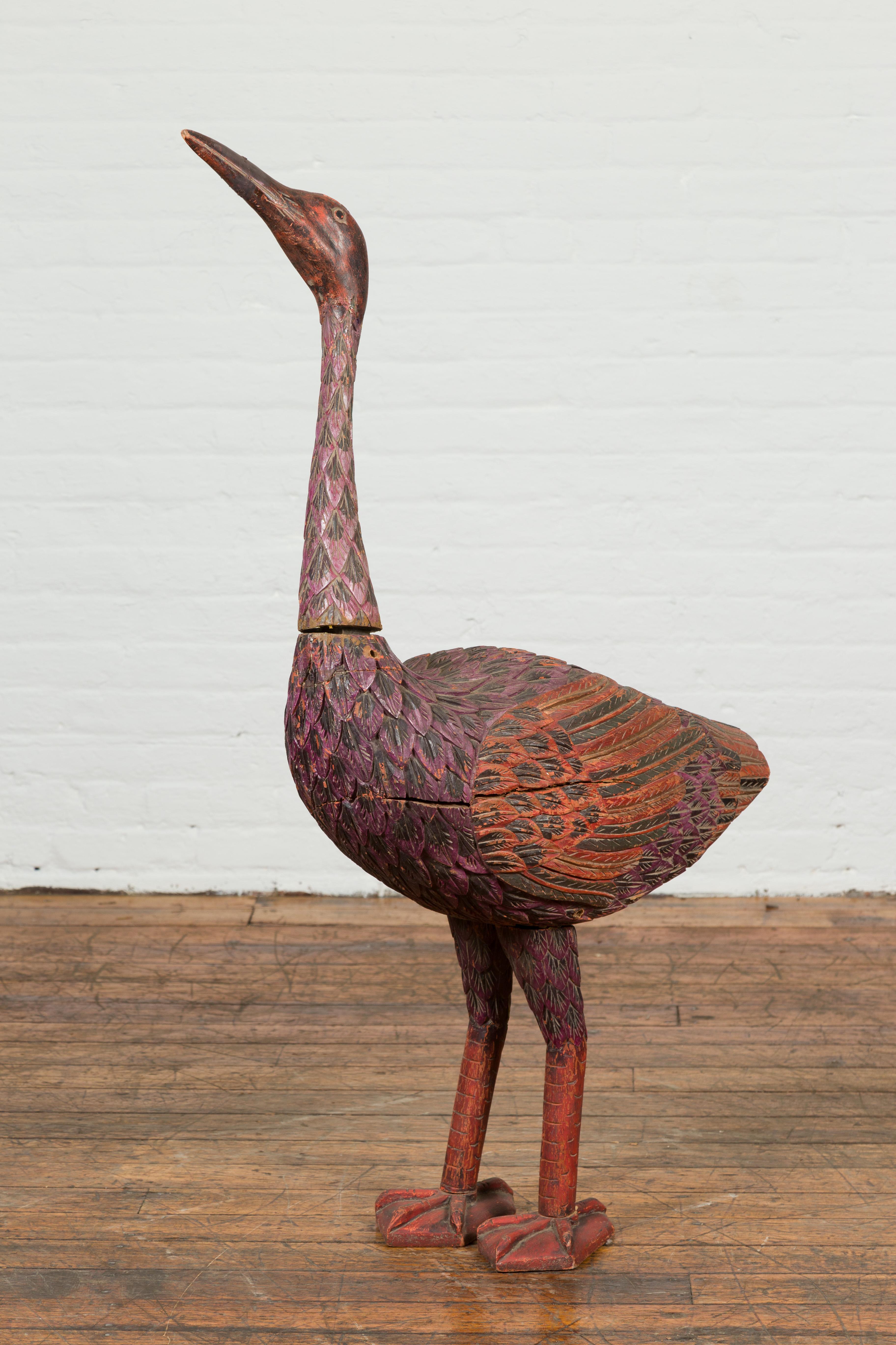 Indonesian Hand Carved Heron Sculpture with Purple, Orange and Black Tones In Good Condition For Sale In Yonkers, NY