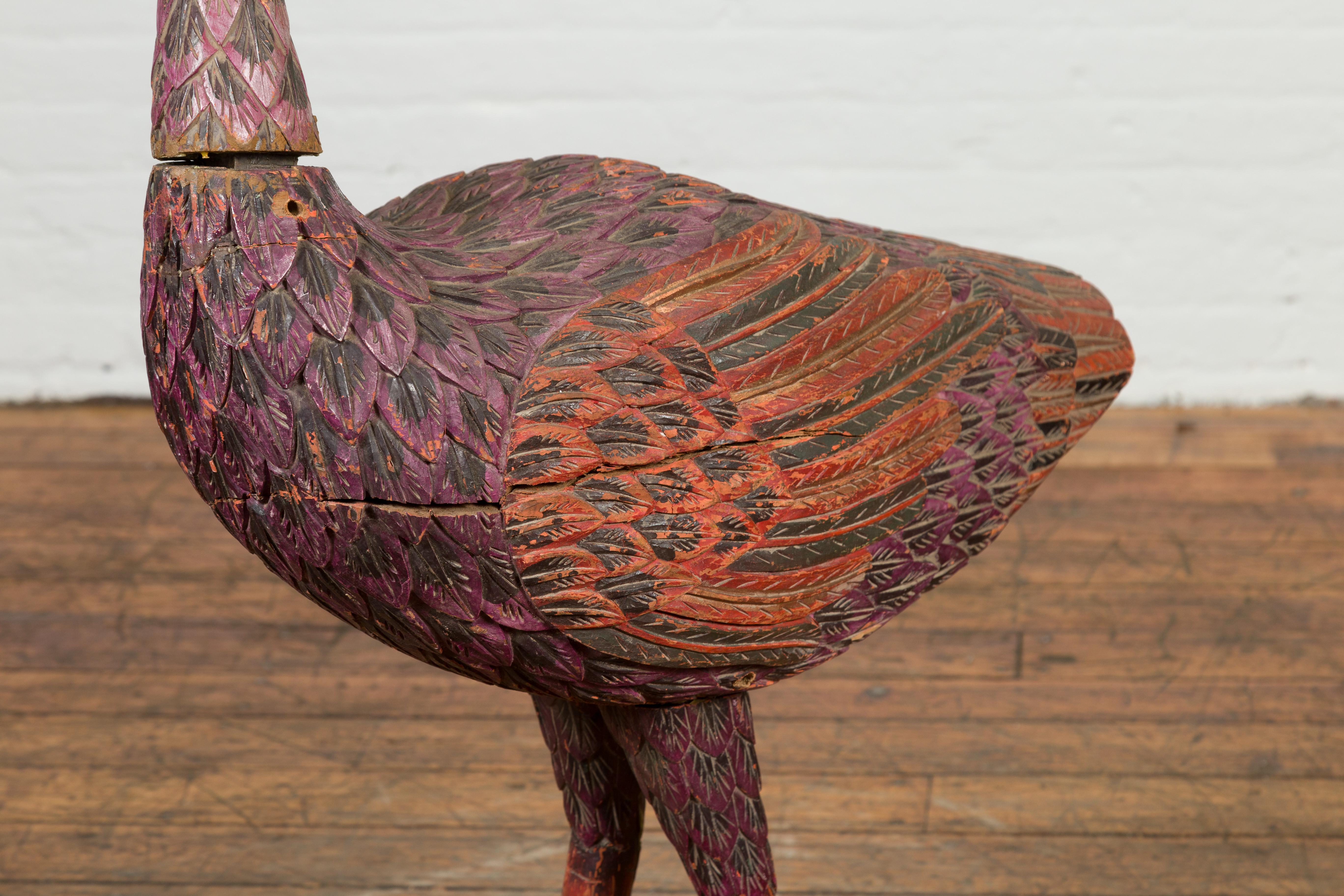 20th Century Indonesian Hand Carved Heron Sculpture with Purple, Orange and Black Tones For Sale