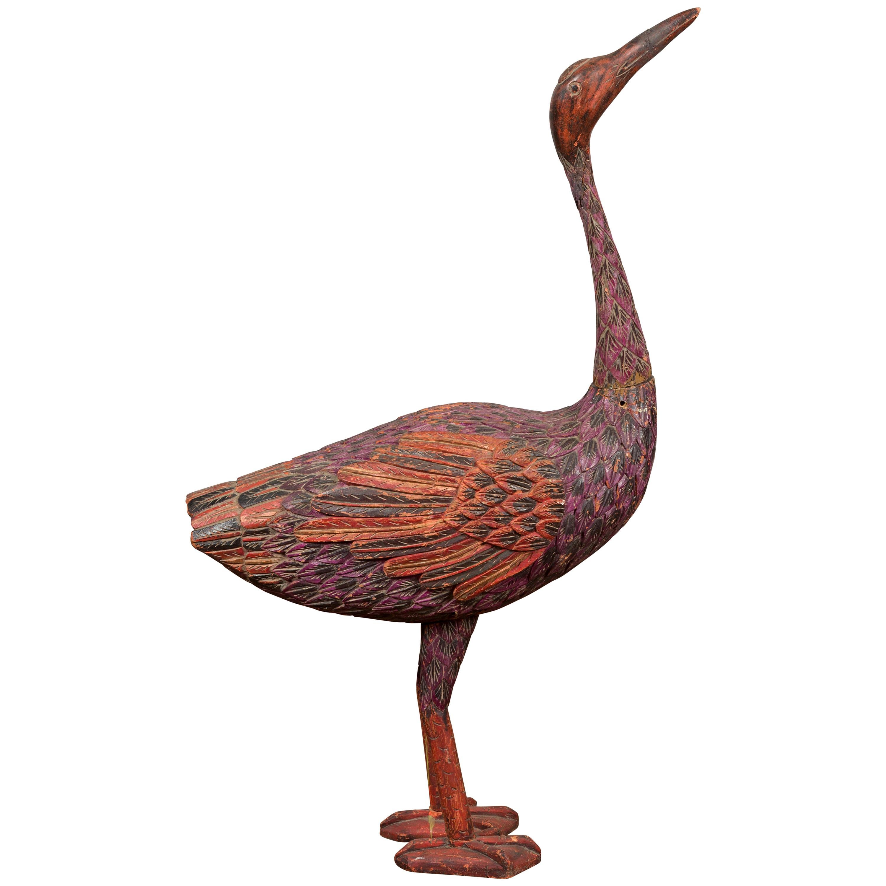 Indonesian Hand Carved Heron Sculpture with Purple, Orange and Black Tones For Sale