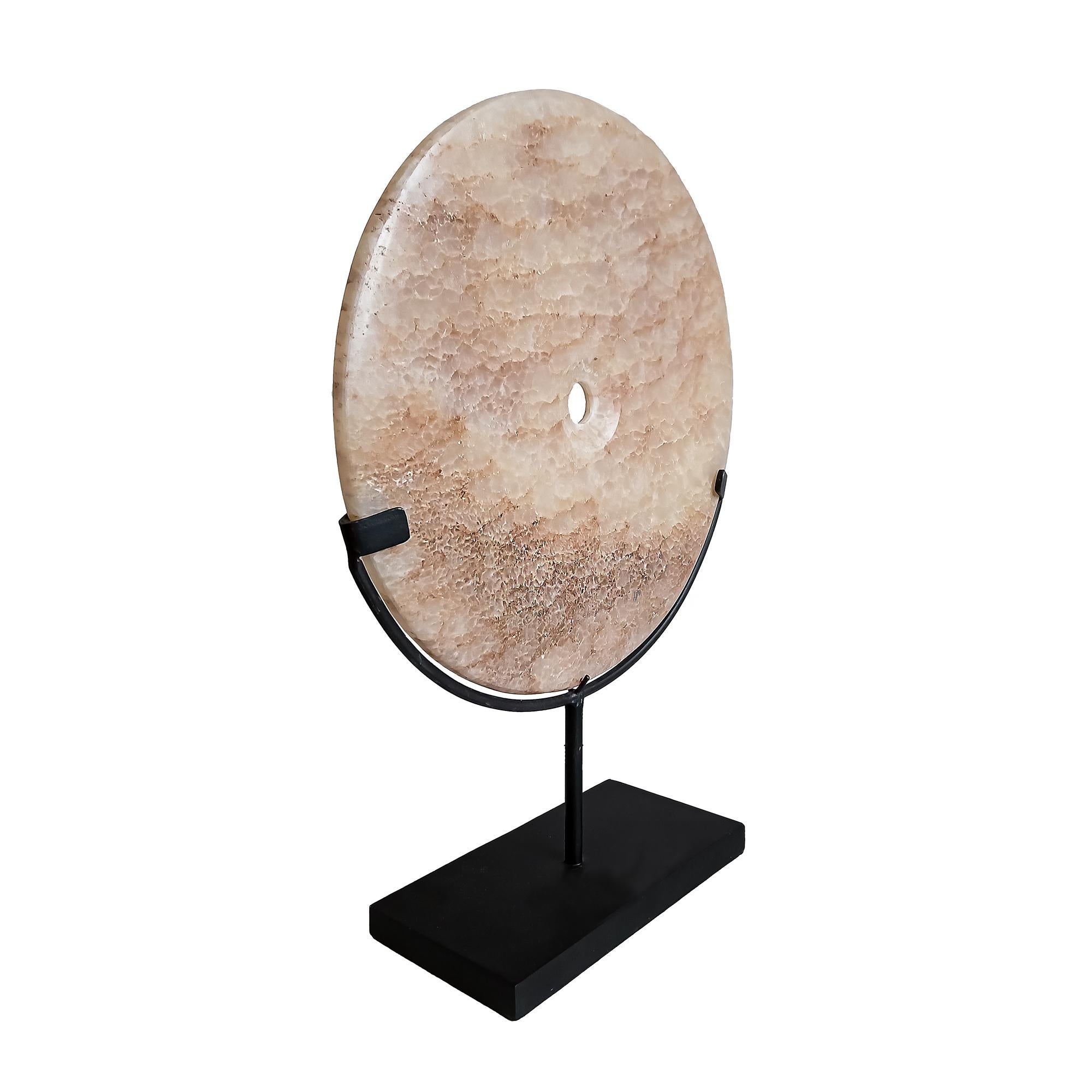 Hand-Carved Indonesian Stone Disk on Stand For Sale