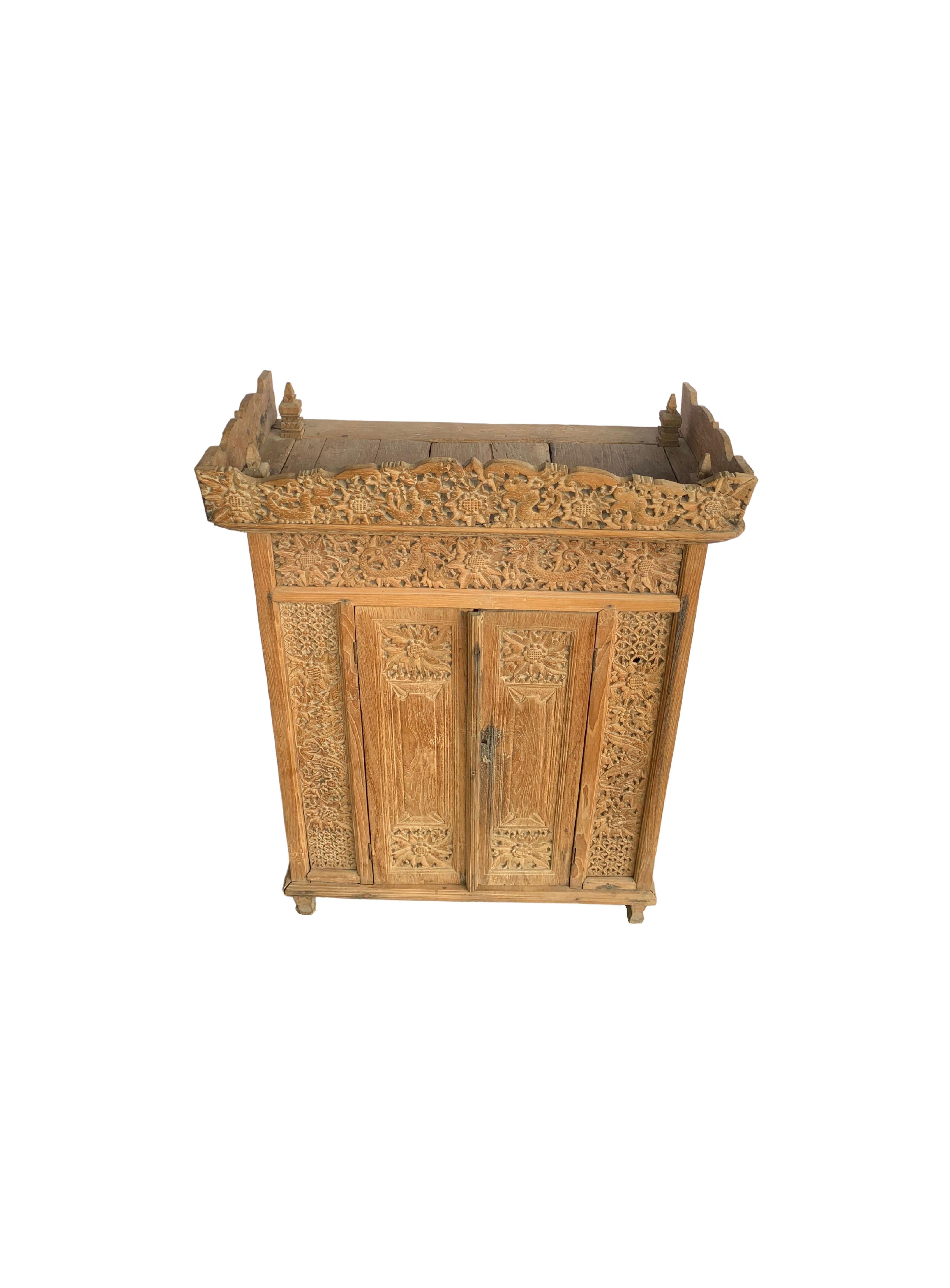 20th Century Indonesian Teak Cabinet from Java with Elaborate Carved Detailing, c. 1950