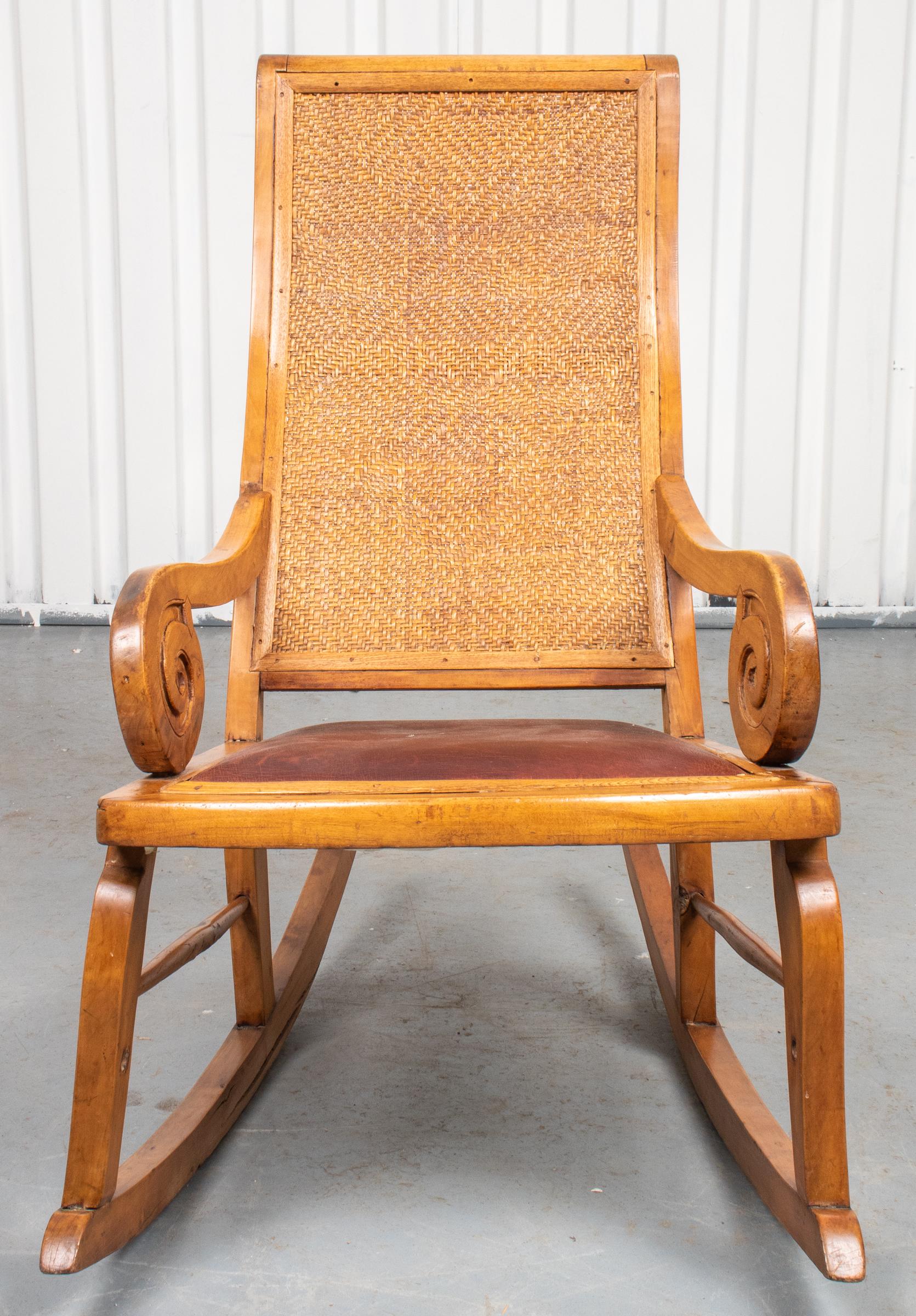 old rocking chair with leather seat