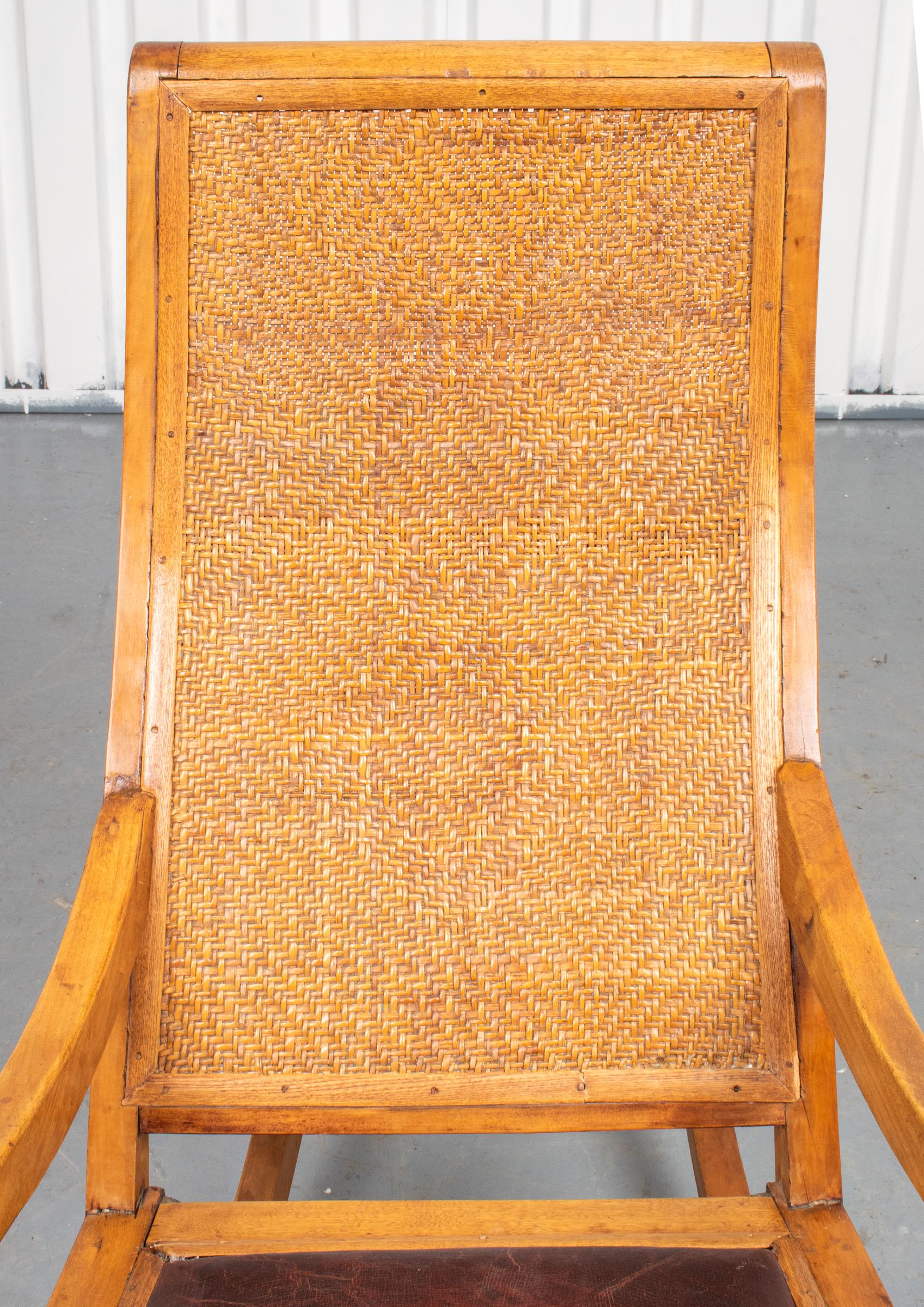 20th Century Indonesian Teak Rocking Chair With Leather Seat
