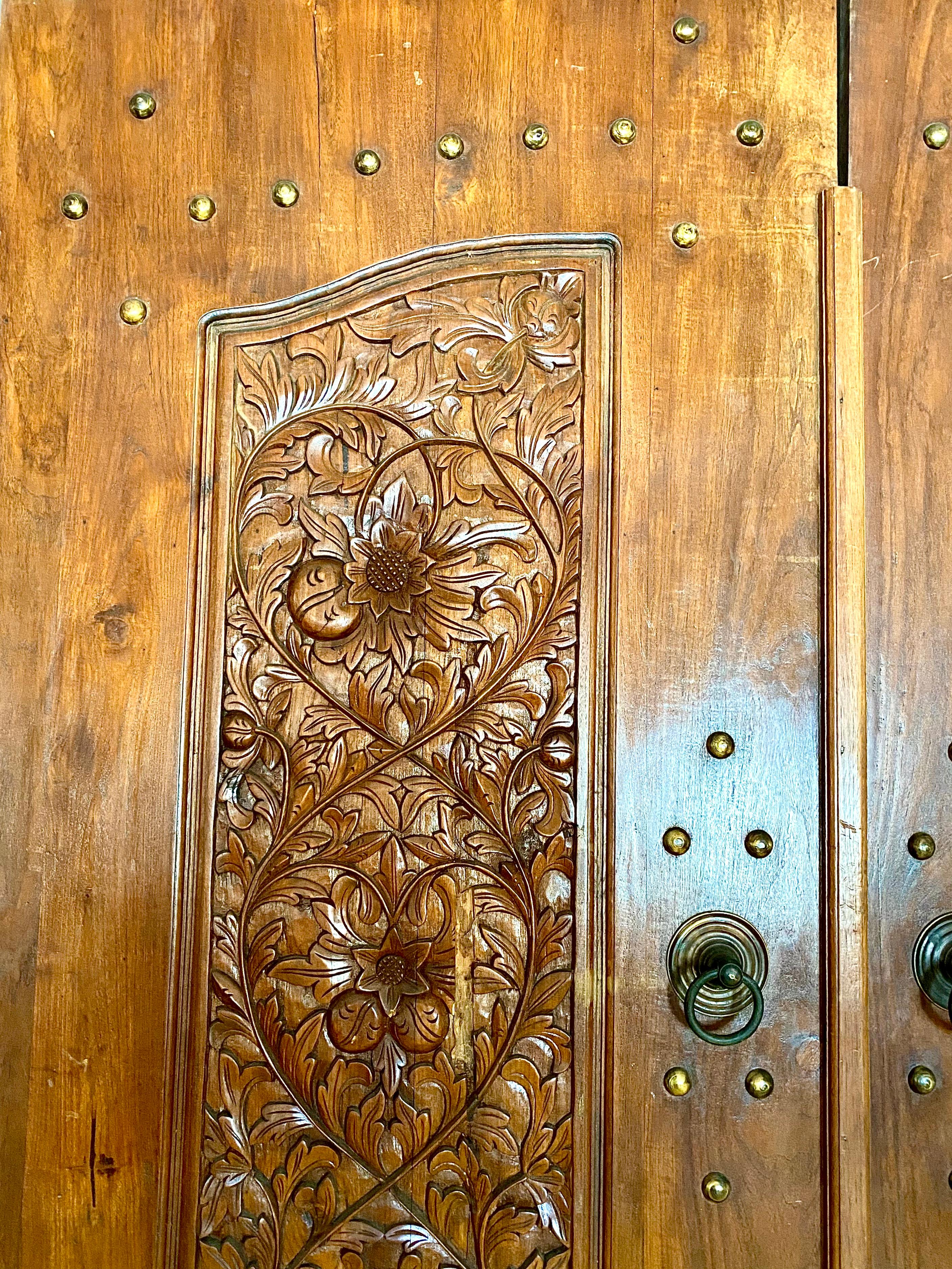This was an entry door to the lavish home in Indonesia. It is Ideal for the entrance door to give a rustic look with a beautiful patina.

Measures: 98