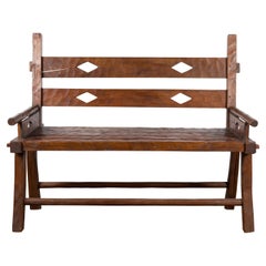 Antique Indonesian Teak Wood Rustic Bench with Pierced Diamond Motifs and Slatted Seat