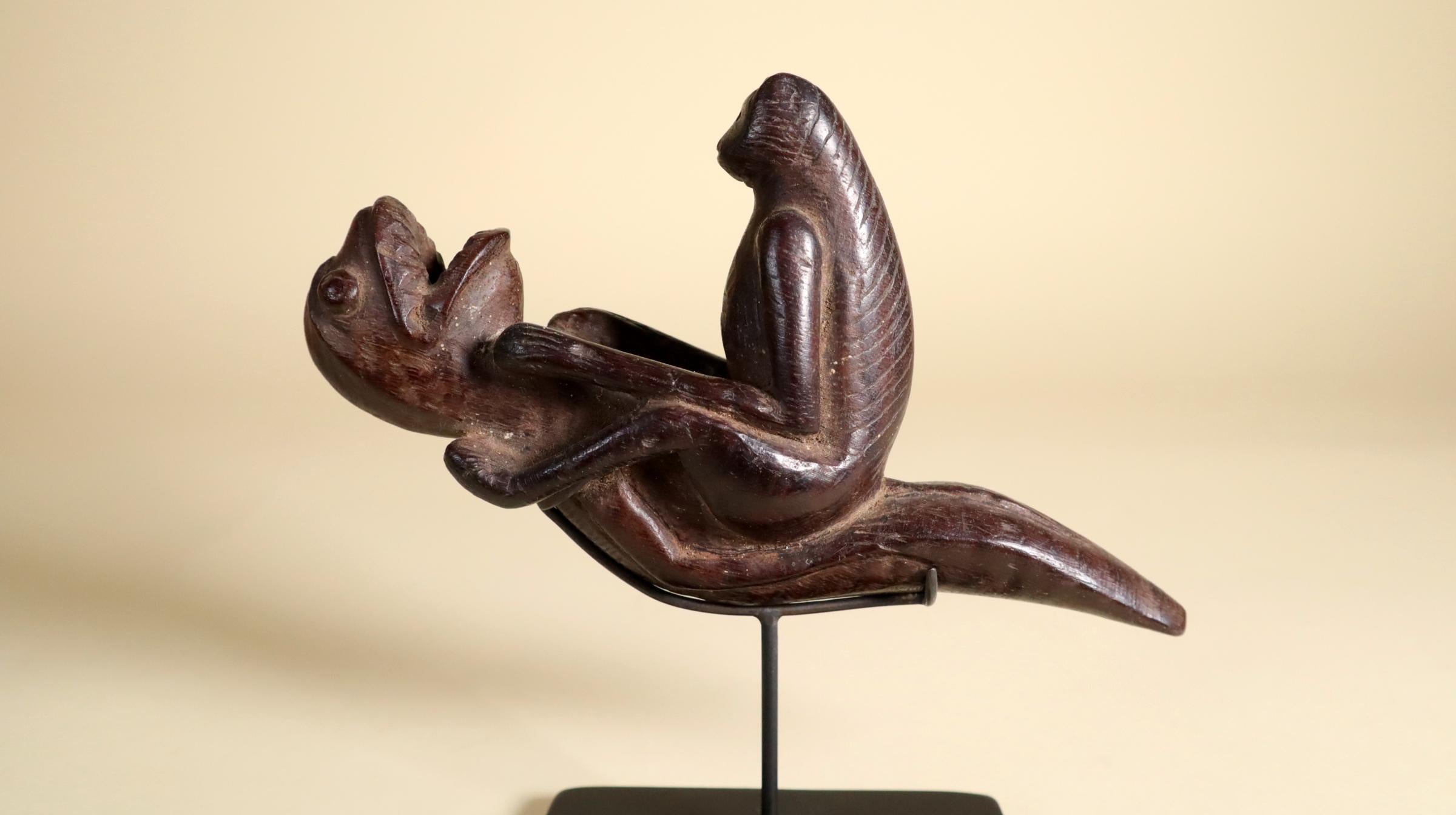 Hand-Carved Indonesian art Tribal Ritual Pipe with Patina Monkey Riding a Sea Monster For Sale