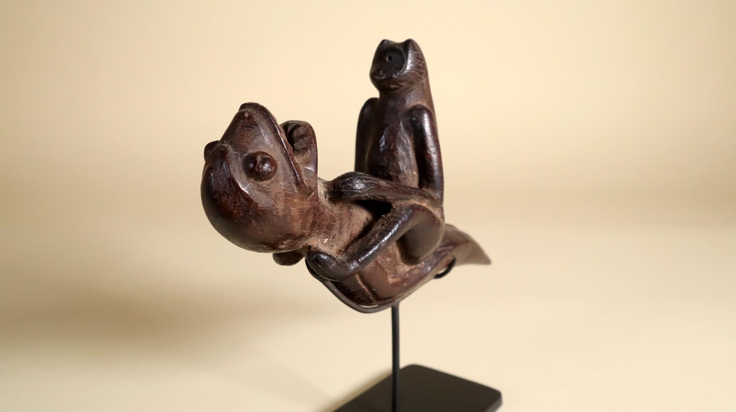Indonesian art Tribal Ritual Pipe with Patina Monkey Riding a Sea Monster In Good Condition For Sale In Santa Fe, NM