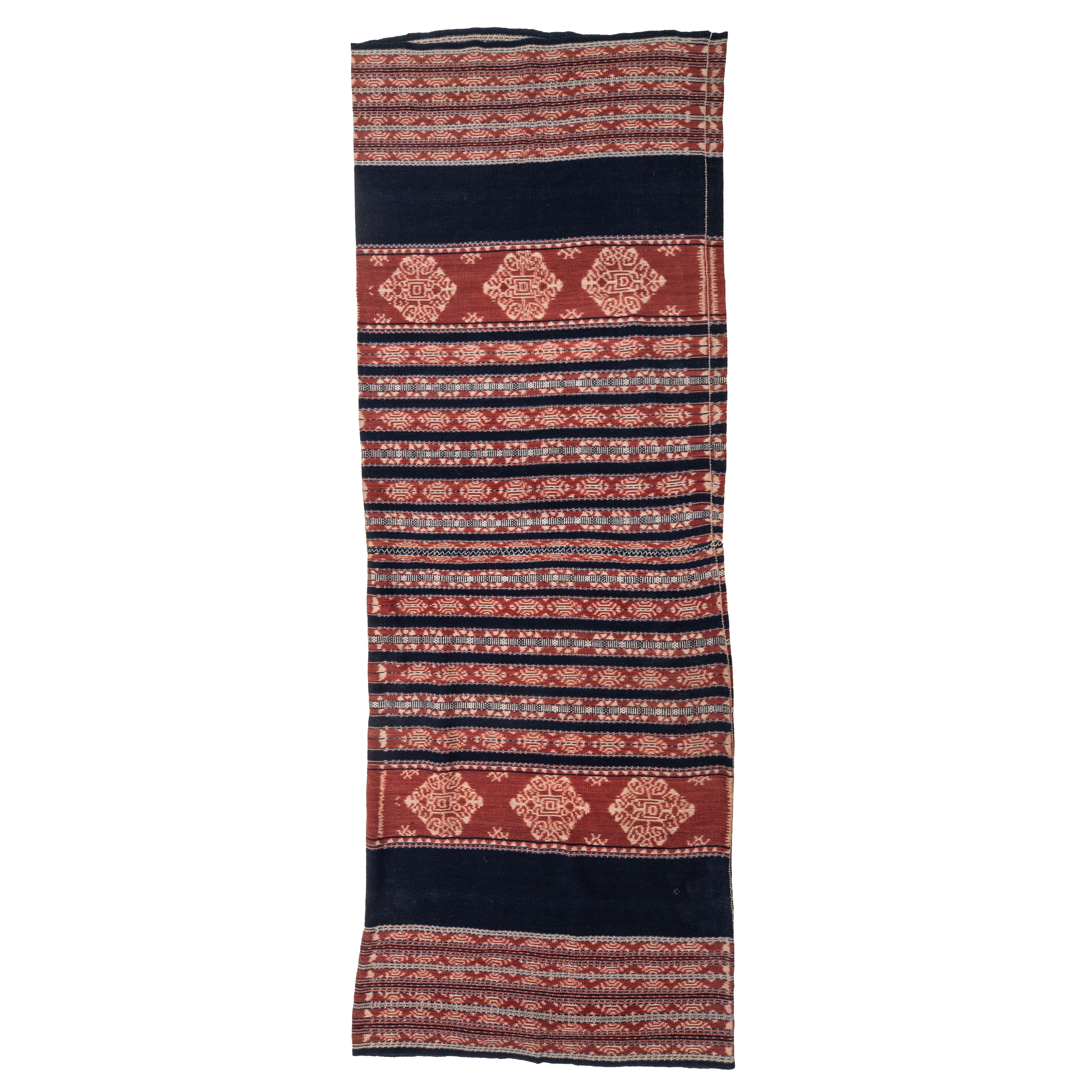 Vintage Indonesian Ikat tube skirt, in good condition. It could well be used as a skirt as well as a throw or for some other recycling projects.
