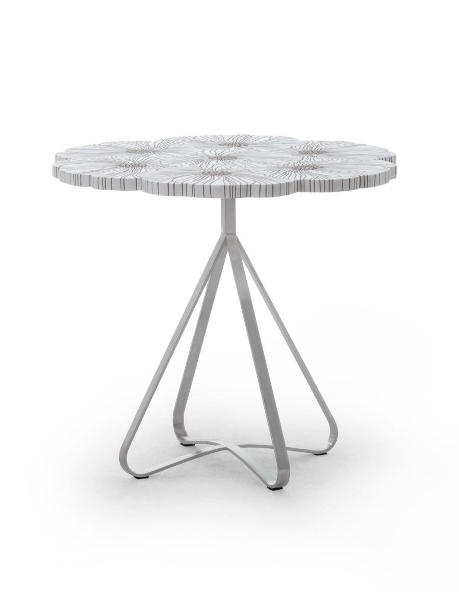 Bouquet end table by Kenneth Cobonpue.
Materials: Fiberglass reinforced polymer and stainless steel.
Dimensions: Diameter 55cm x height 50cm.

An exquisitely eye-catching centerpiece, Bouquet makes any day feel like a special occasion. The