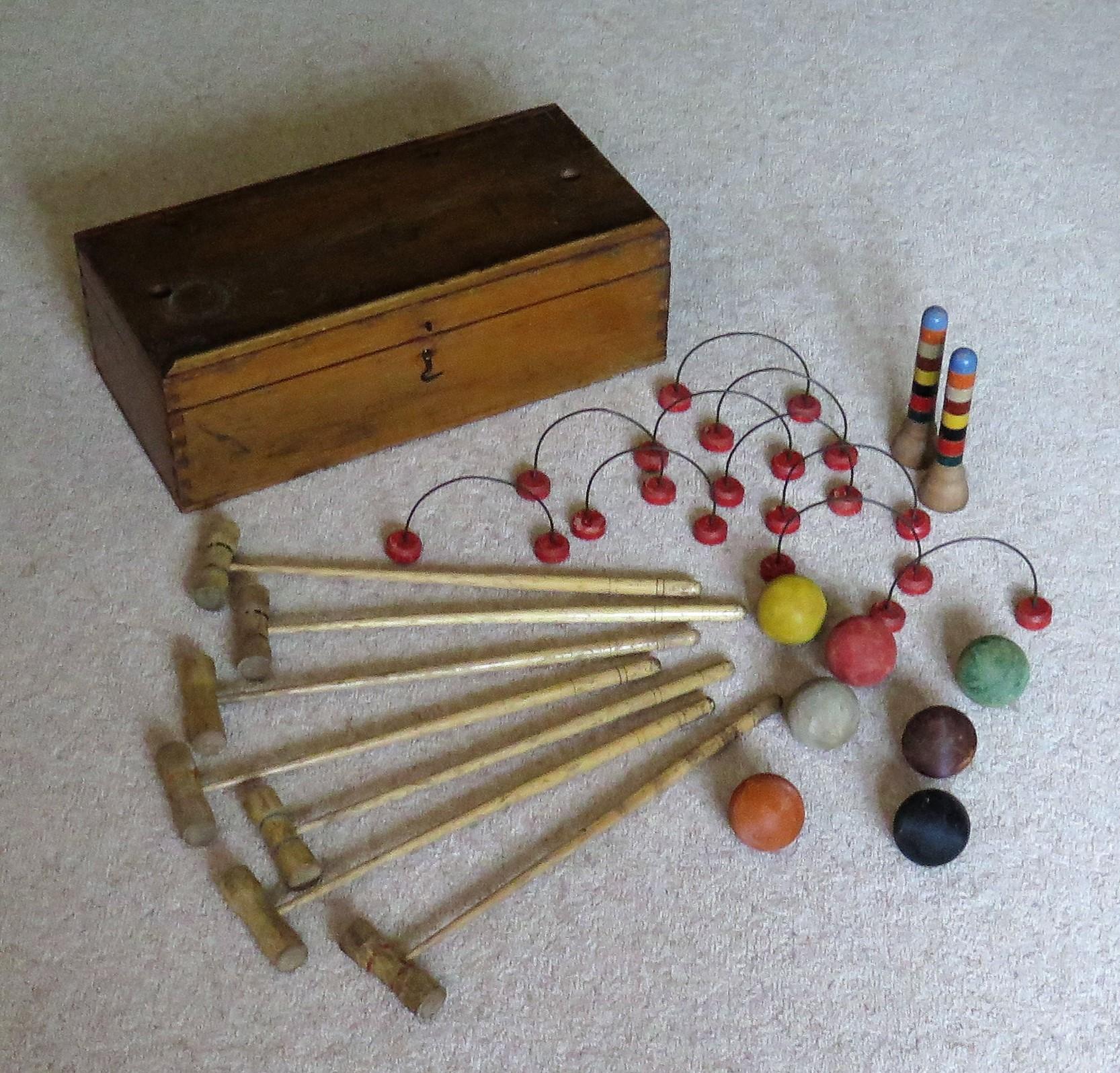 This is an original indoor or carpet croquet set game, coming with its own jointed wooden storage box, all dating to the early 20th century, circa 1930.

This is a classic game of strategy and skill, fun to play for all age groups.

The set has