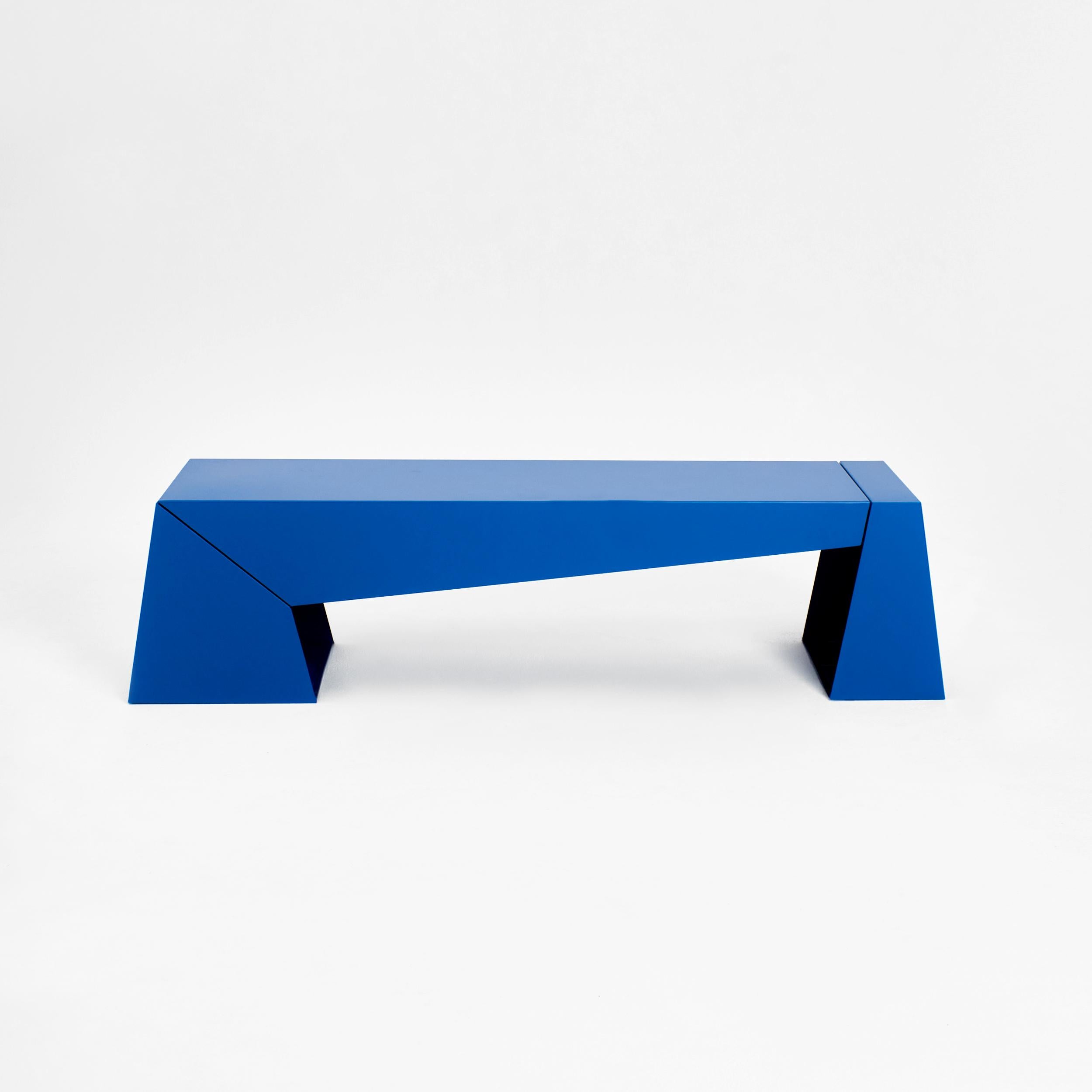 Indoor Folded Bench by Project 213A
Dimensions: D 45 x  W 178 x  H 44 cm
Materials: Metal. 

Three pieces of steel folded together and joined through metal elements, and powder coated. The asymmetric finish of the bench with small gaps between each