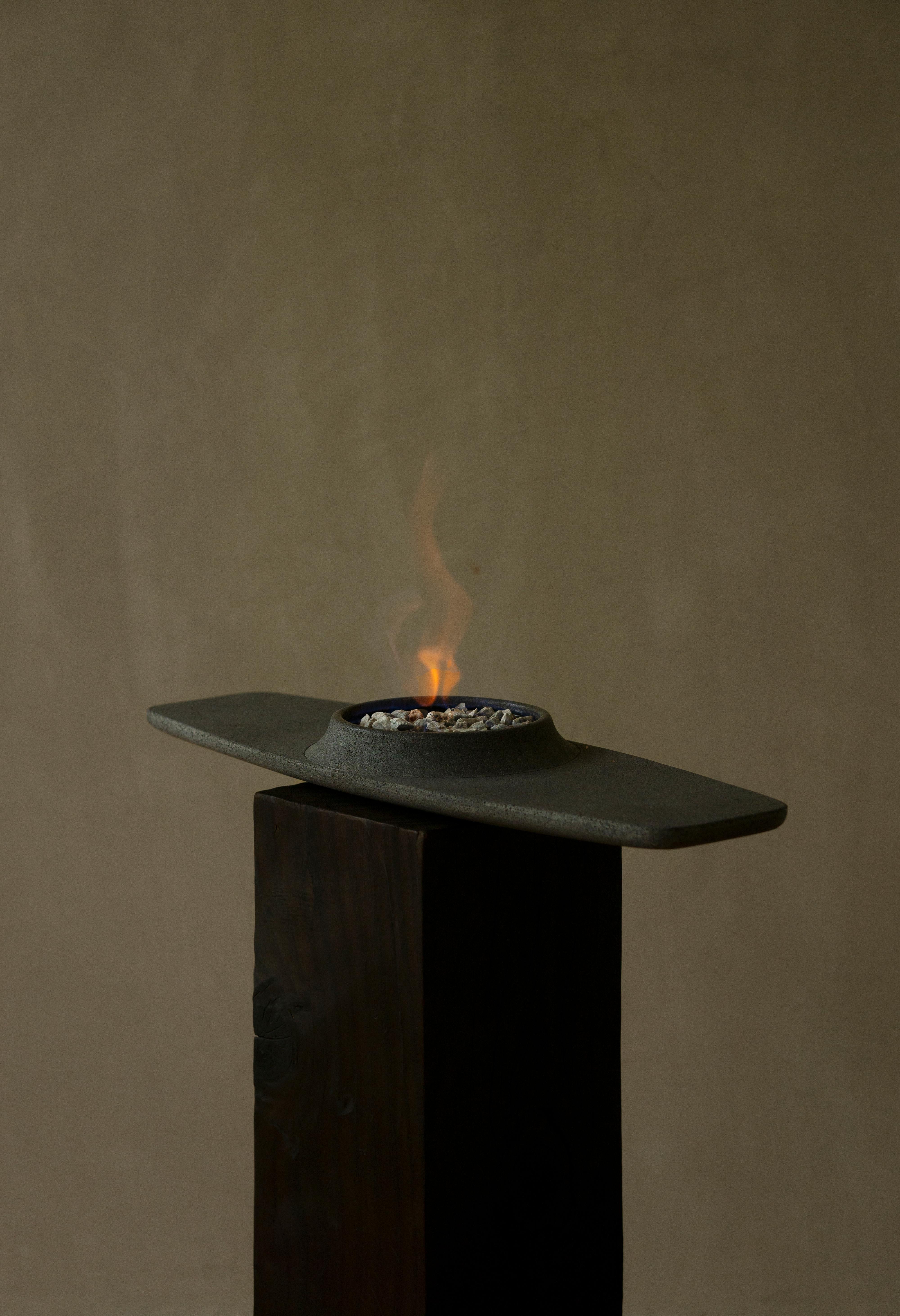 Inspired by fire, earth, nature and a tribute to my fascination to architecture, 
Fusina is an indoor fire pit that extracts essential elements from venetian architect Carlo Scarpa and his unique style of simplicity, but overlapping geometries.
