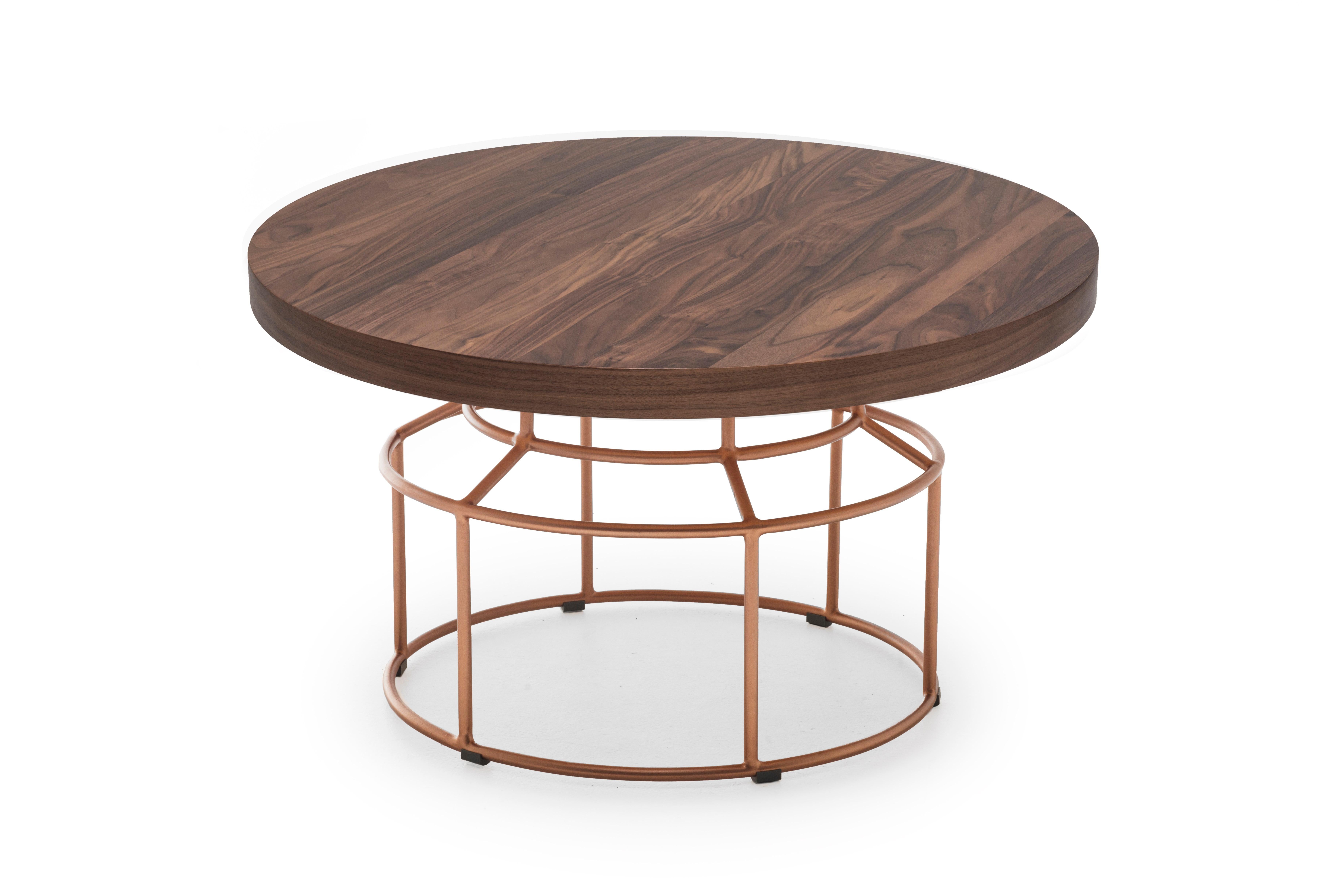 Indoor high mason coffee table by Kenneth Cobonpue.
Materials: Walnut, Steel. 
Also available in other colors.
Dimensions: Diameter 70cm x H 45cm 

Jars are typically placed on shelves and cupboards. Mason is a reimagining of that, transforming