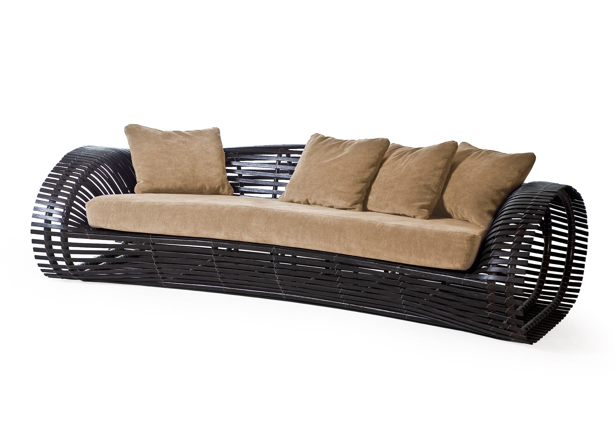 Indoor Lolah sofa by Kenneth Cobonpue
Materials: Rattan, nylon.
Also available in other colors and for outdoors.
Dimensions: 120 cm x 240 cm x H 72 cm

Created using construction techniques similar to boat-building, Lolah entices the sitter
