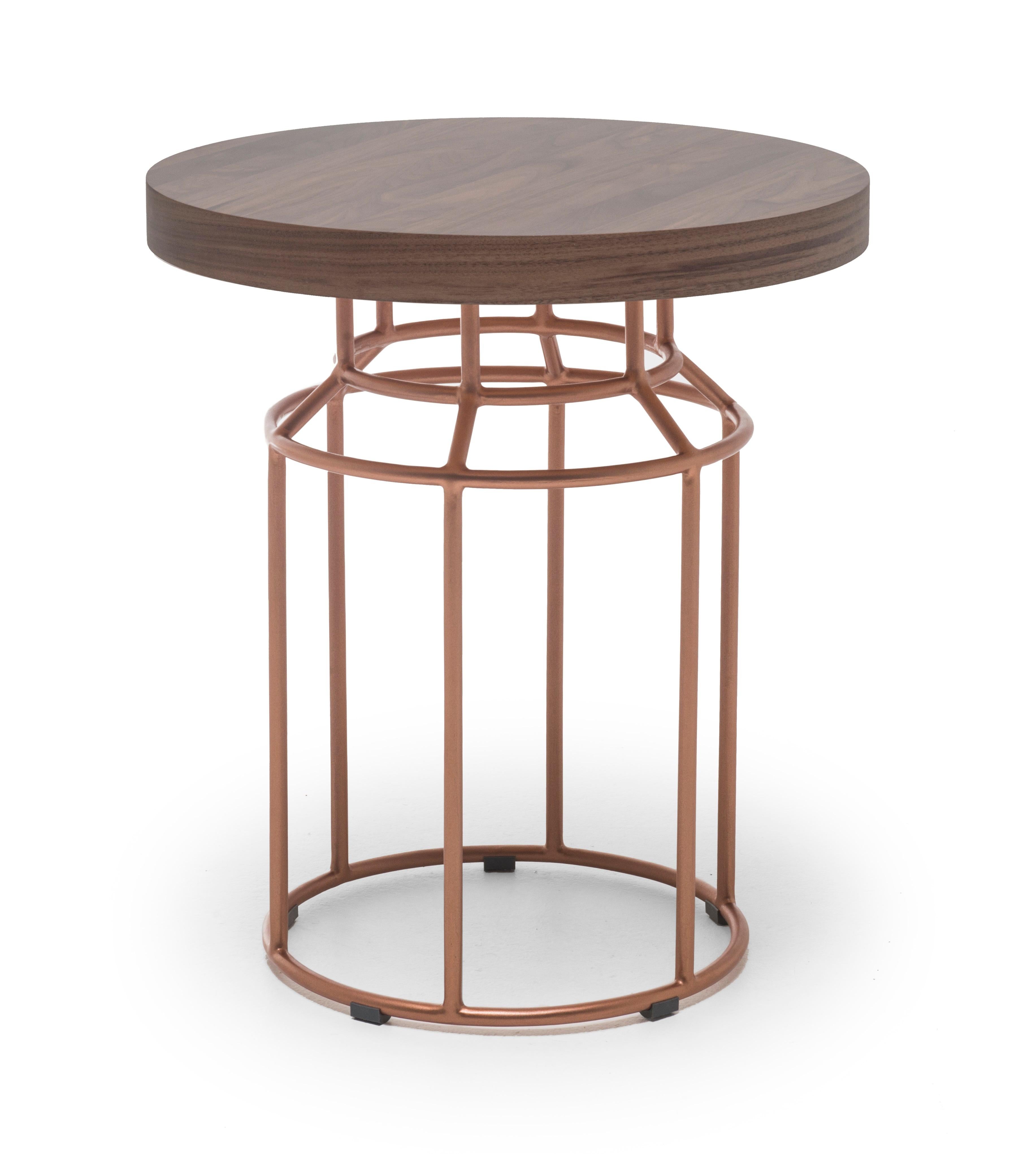 Indoor Mason end table by Kenneth Cobonpue.
Materials: walnut, steel. 
Also available in other colors and for outdoors.
Dimensions: diameter 50cm x height 55cm.

Jars are typically placed on shelves and cupboards. Mason is a reimagining of
