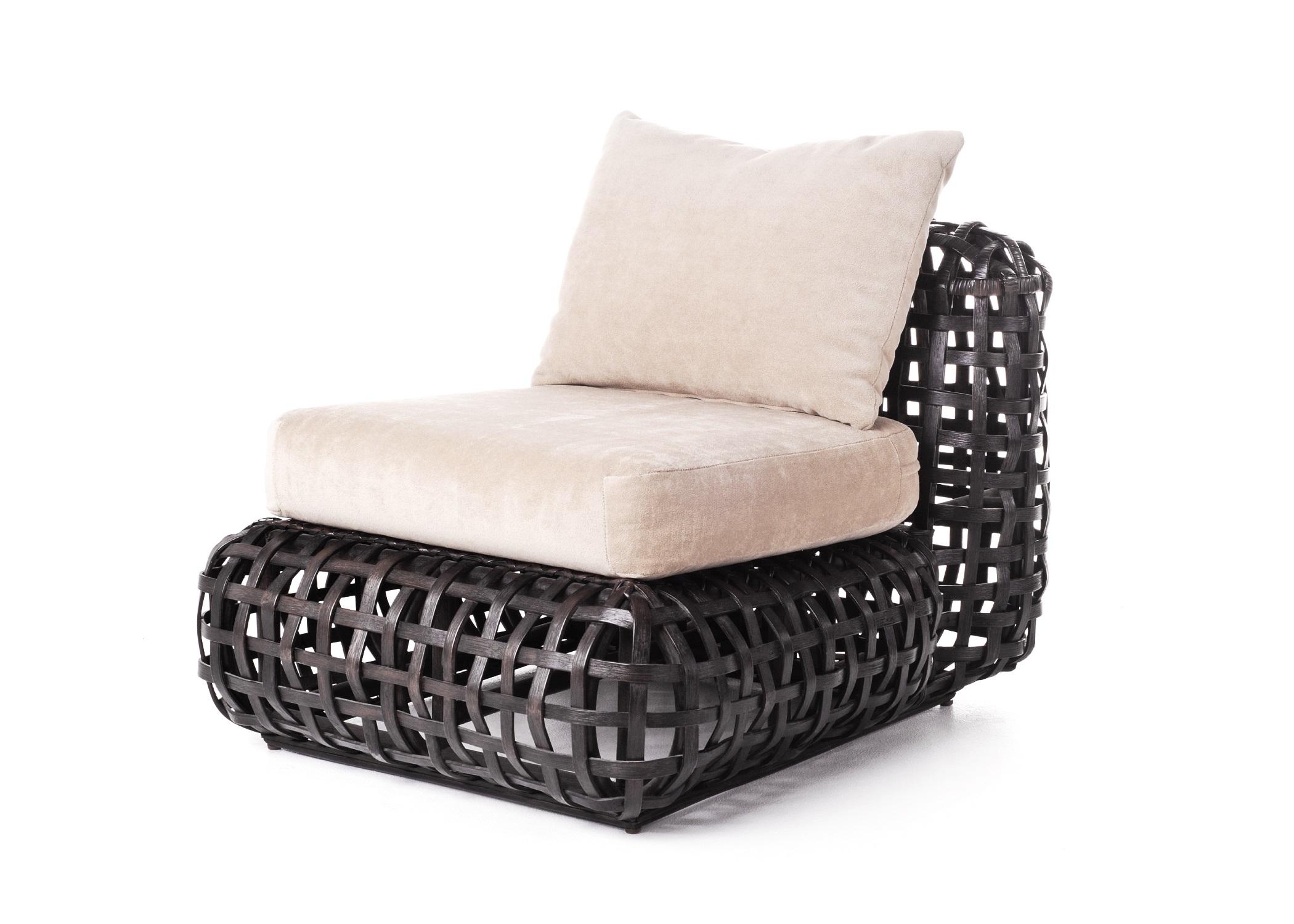 Indoor matilda easy chair by Kenneth Cobonpue.
Materials: Rattan.
Also available in other colors and for outdoors.
Dimensions: 100cm x 81cm x H 63cm.

The same principle of a woven basket is used in making Matilda. This vast collection of