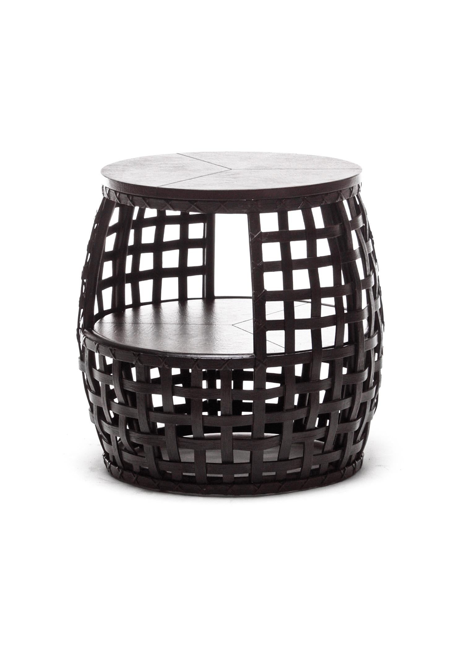 Indoor matilda end table by Kenneth Cobonpue.
Materials: Rattan. Glass.
Also available in other colors and for outdoors. 
Dimensions: 
Glass top diameter 45cm x height 6mm shelve diameter 50.5cm x height 6mm
Table diameter 56cm x height