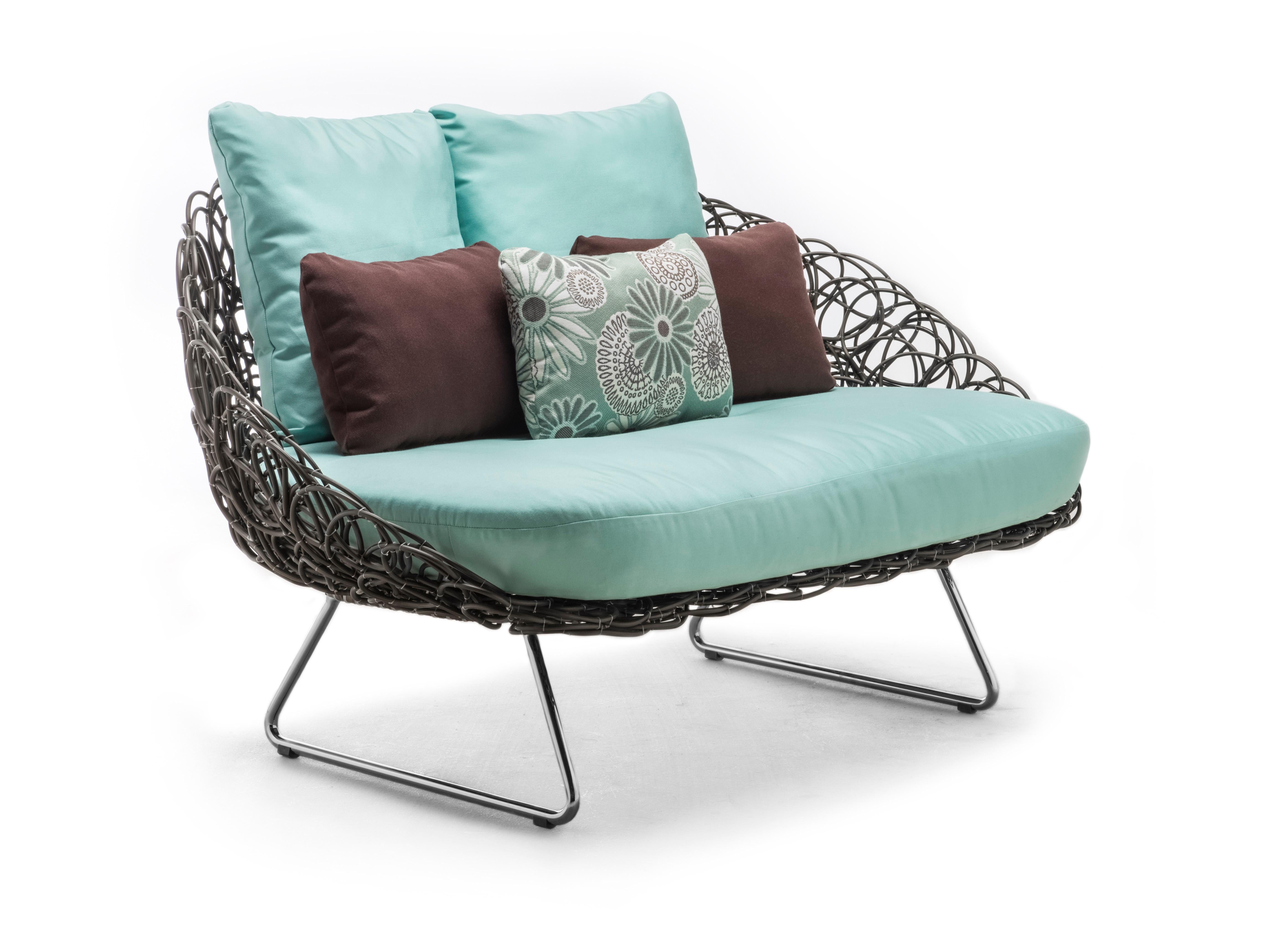 Indoor noodle loveseat by Kenneth Cobonpue.
Materials: Rattan, nylon, stainless steel, steel. 
Also available in other colors and for outdoors.
Dimensions: 96 cm x 153 cm x H 85 cm

Spontaneous and playful, Noodle celebrates serendipitous