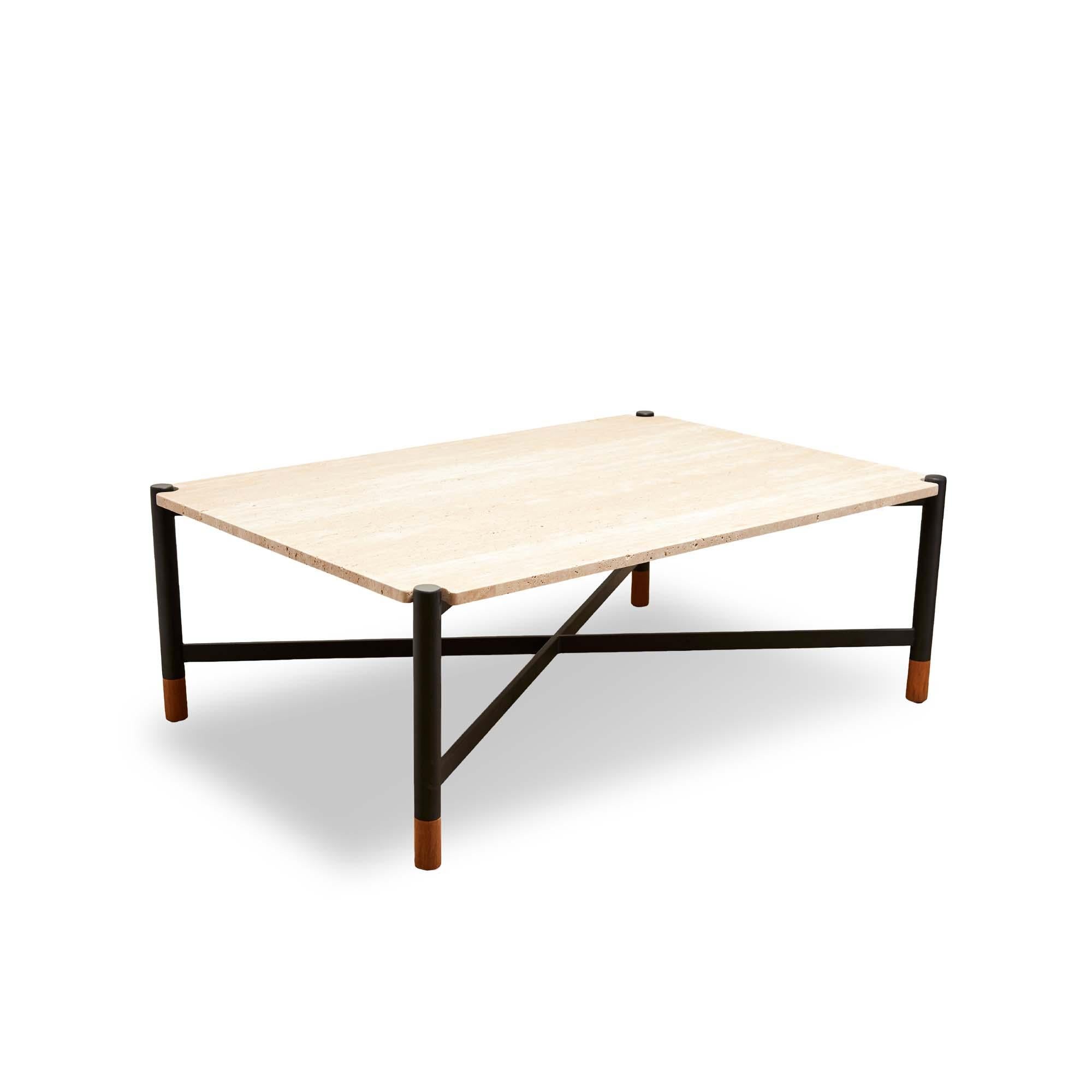 The outdoor Bronson coffee table features a turbo or walnut travertine top with notched corners that rests atop a powder coated steel base with teak feet. Can be used indoors or outdoors.

The Lawson-Fenning Collection is designed and handmade in
