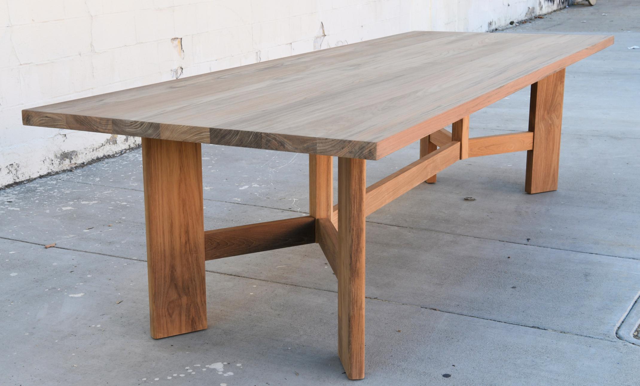 Designed to withstand any climate, this teak dining table can be used either indoors or outdoors. Seen here in 120
