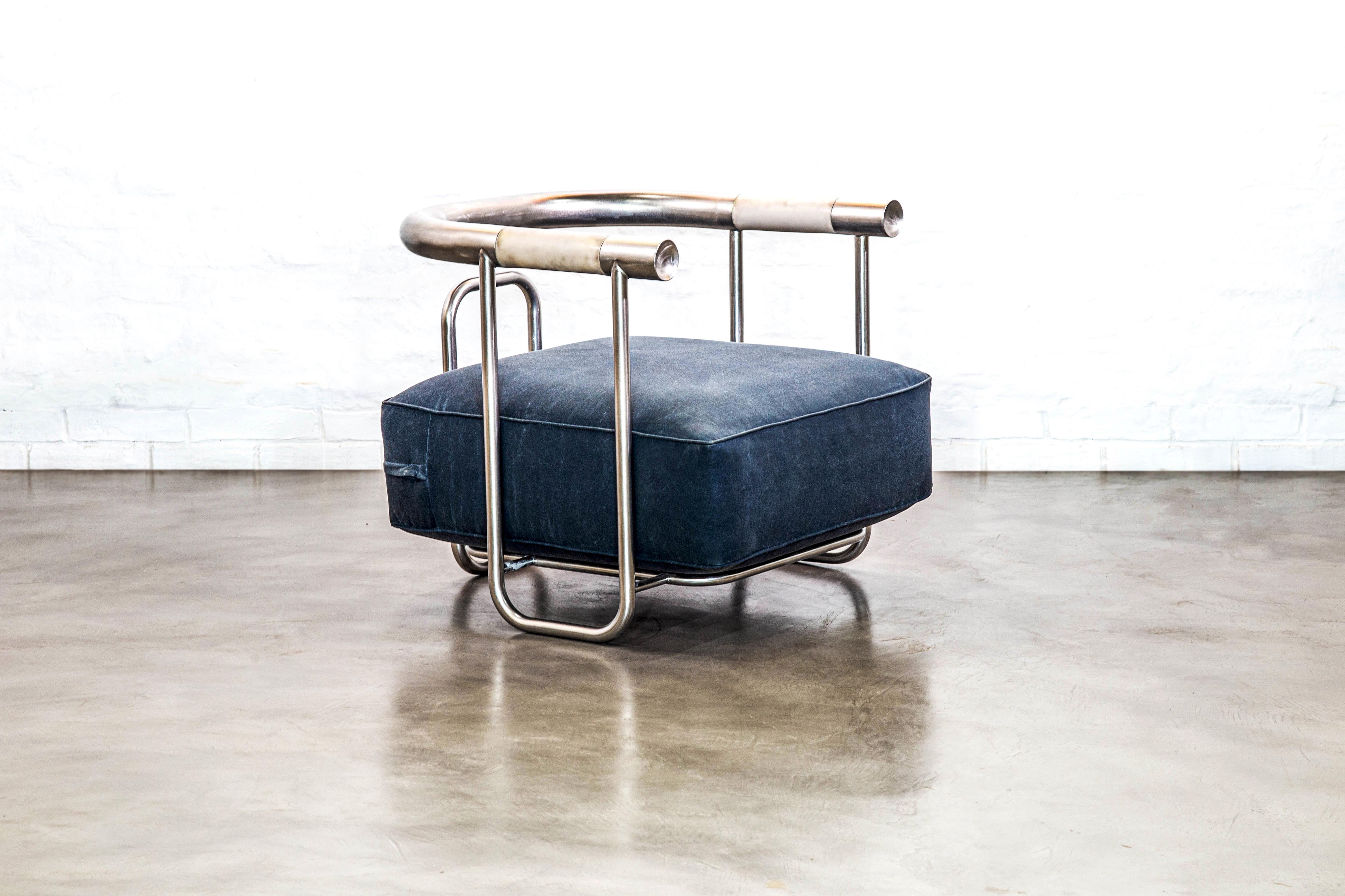 Studio Armin’s Baby Bull is a nautically inspired chair that was built to withstand the outdoors while being versatile enough for indoor living.
 
With a stainless-steel frame and wax canvas cushion, the Baby Bull is left to form and function while