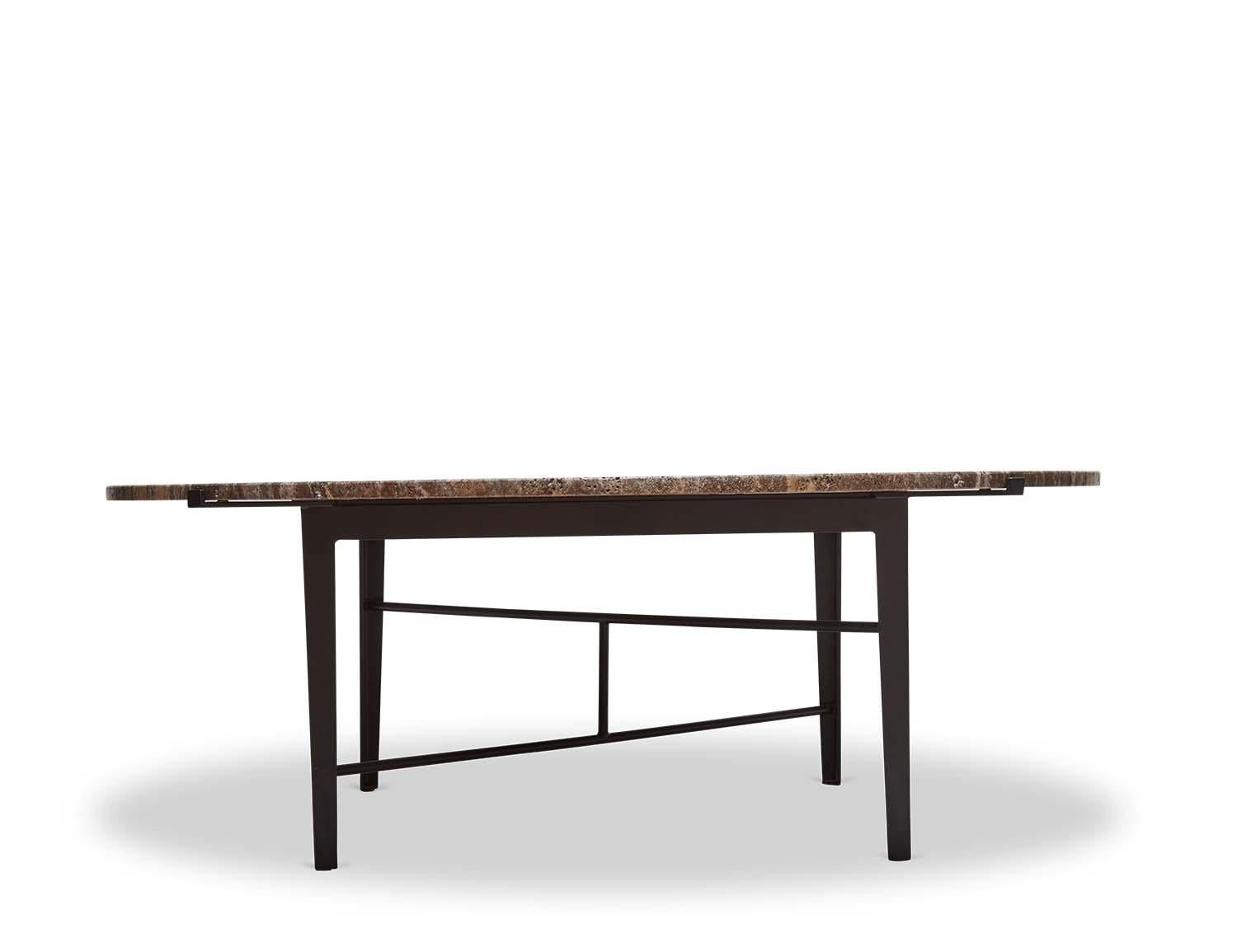 The Montrose coffee table is an open-grain honed travertine coffee table with a matte black powder coated steel base. For indoor or outdoor use.

The Lawson-Fenning Collection is designed and handmade in Los Angeles, California.

Message us to find